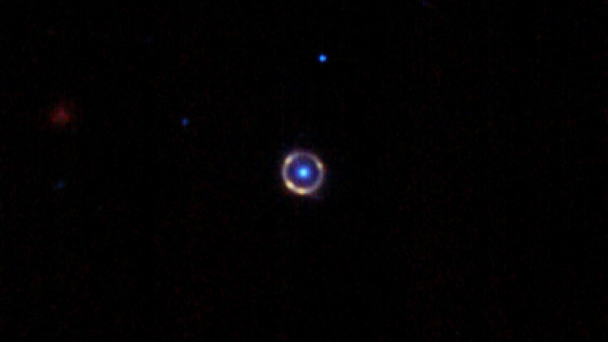 Nearly Perfect Einstein Ring 12 Billion LightYears Away Spotted by