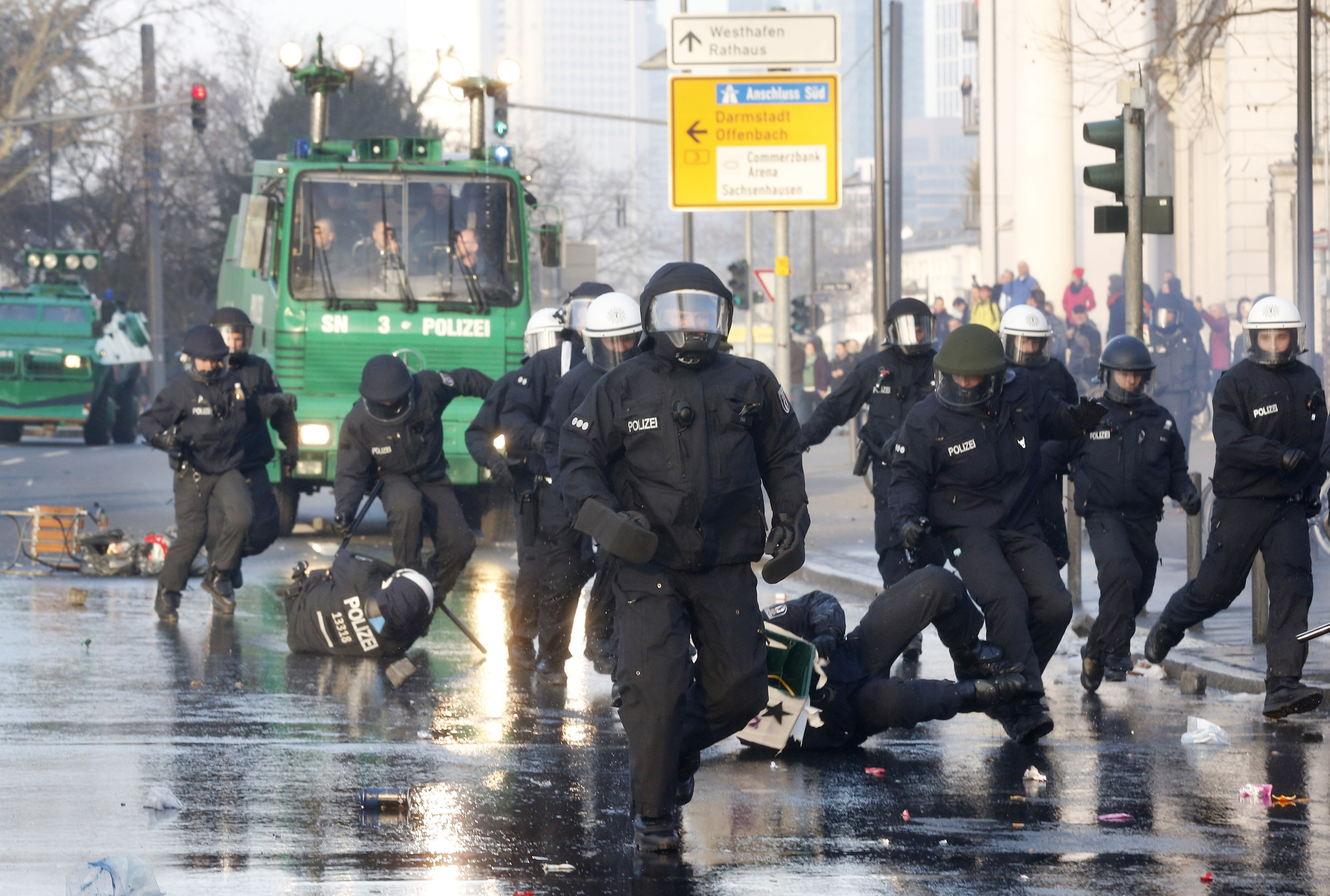 Thousands Of Protesters Clash With Riot Police Near New European