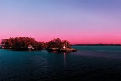 Sunset Over The Island Canvas Print by Beli iCanvas