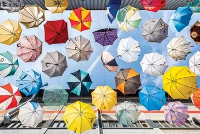 Colourful Umbrellas Canvas Art Print by Jan Becke iCanvas
