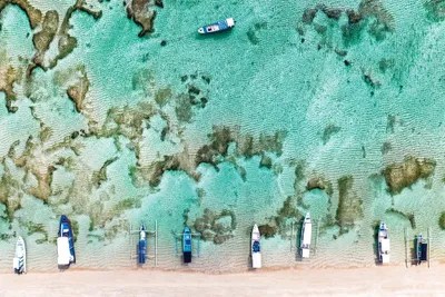 Aerial Summer Coral Boats Can Canvas Wall Art Philippe Hugonnard