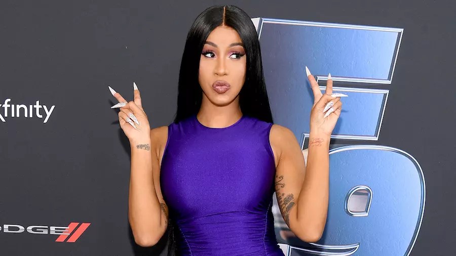 Cardi B Reveals Massive Butterfly Back Tattoo (And It's ...