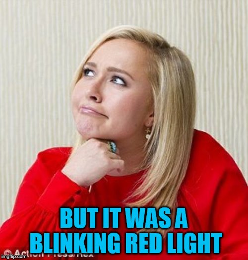 If You're Going To Run A Red Light, Don't Do It With A Cop Behind You