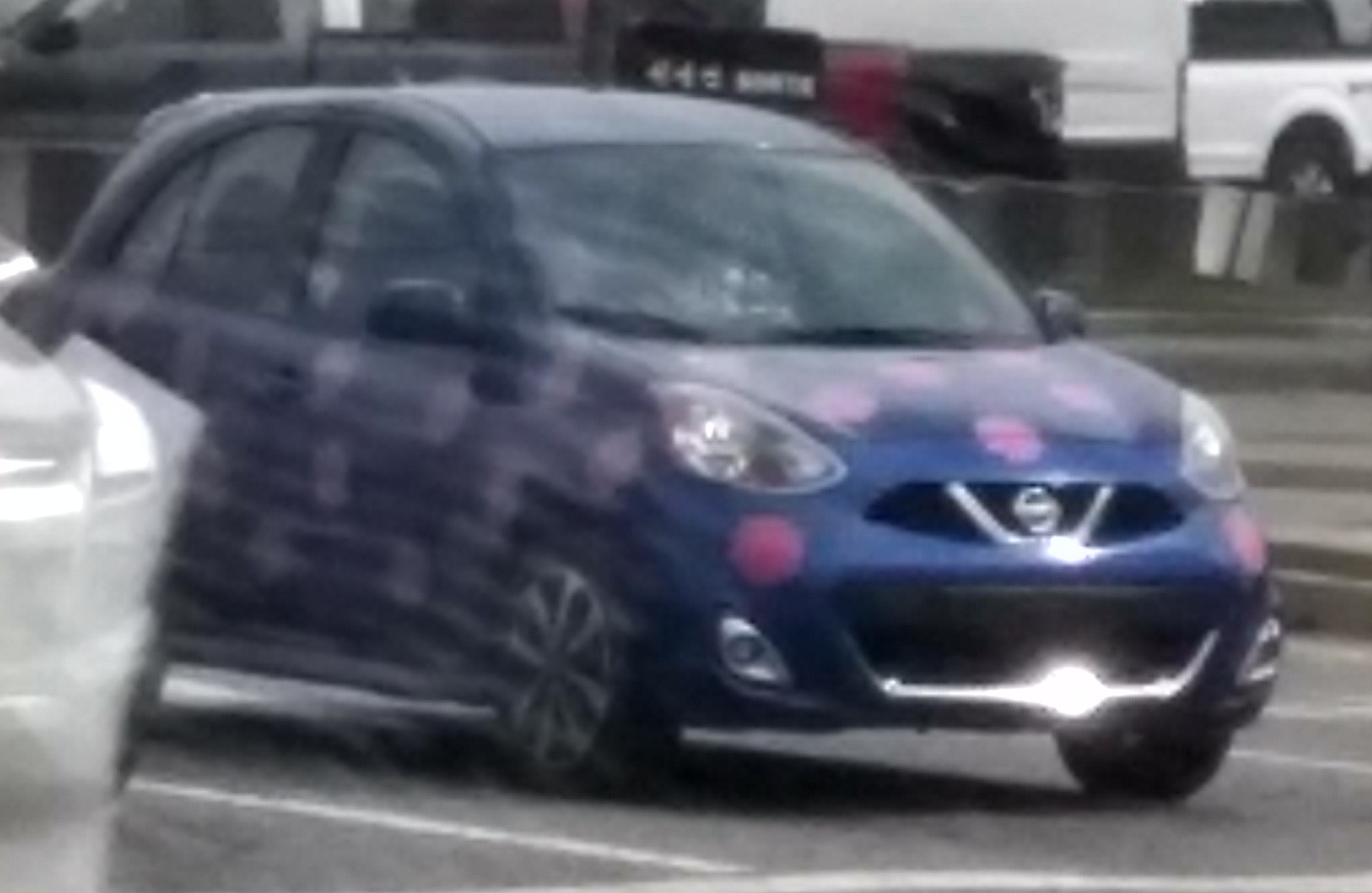 Blue Nissan Micra with pink polka dots Memes Imgflip