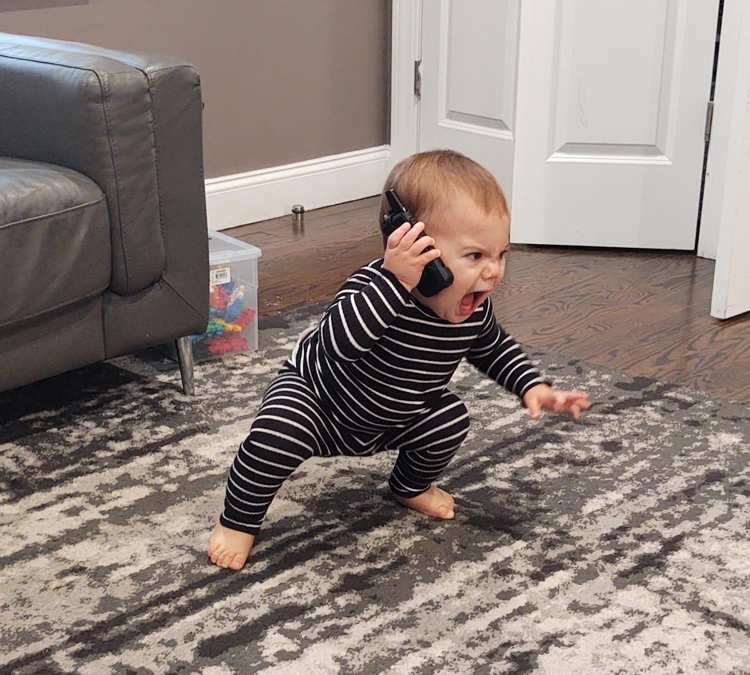 baby screams into phone Memes Imgflip