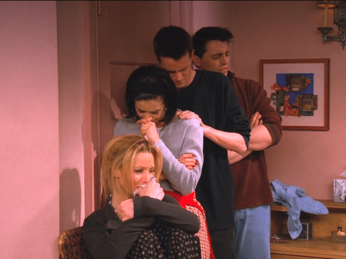 Two People Crying Together