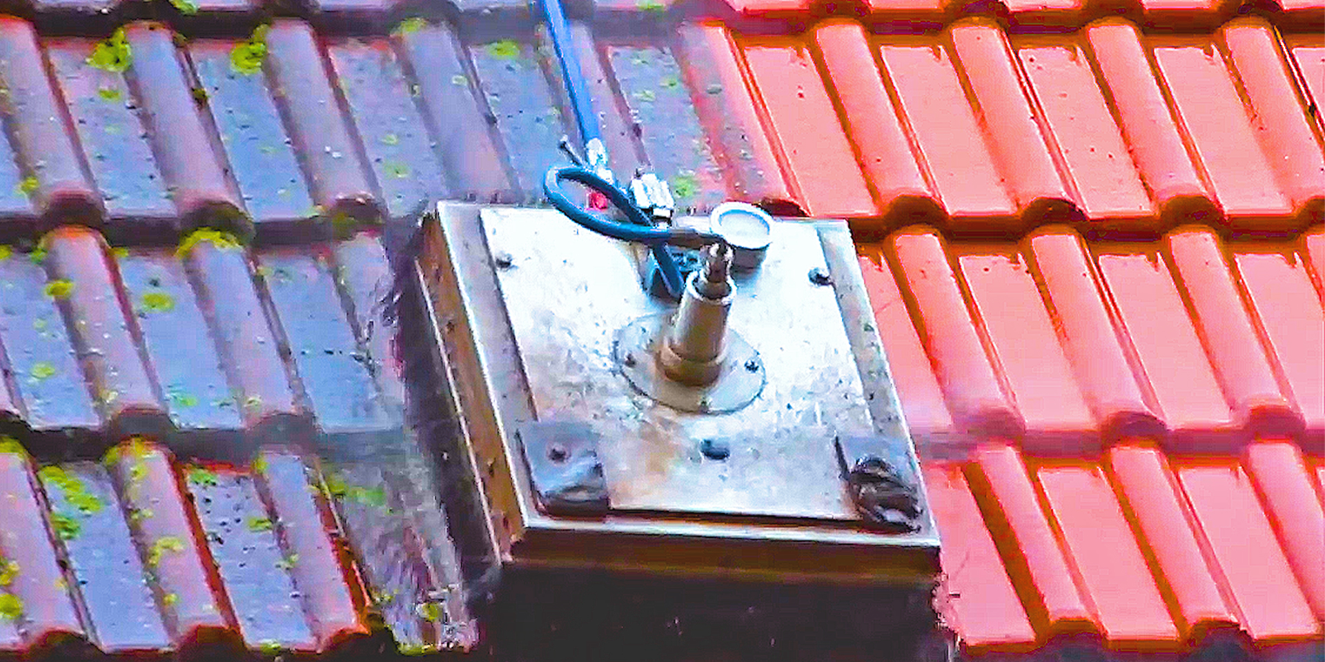 The Aqua Jet Cleaning System Is a Lawnmower for Your Roof