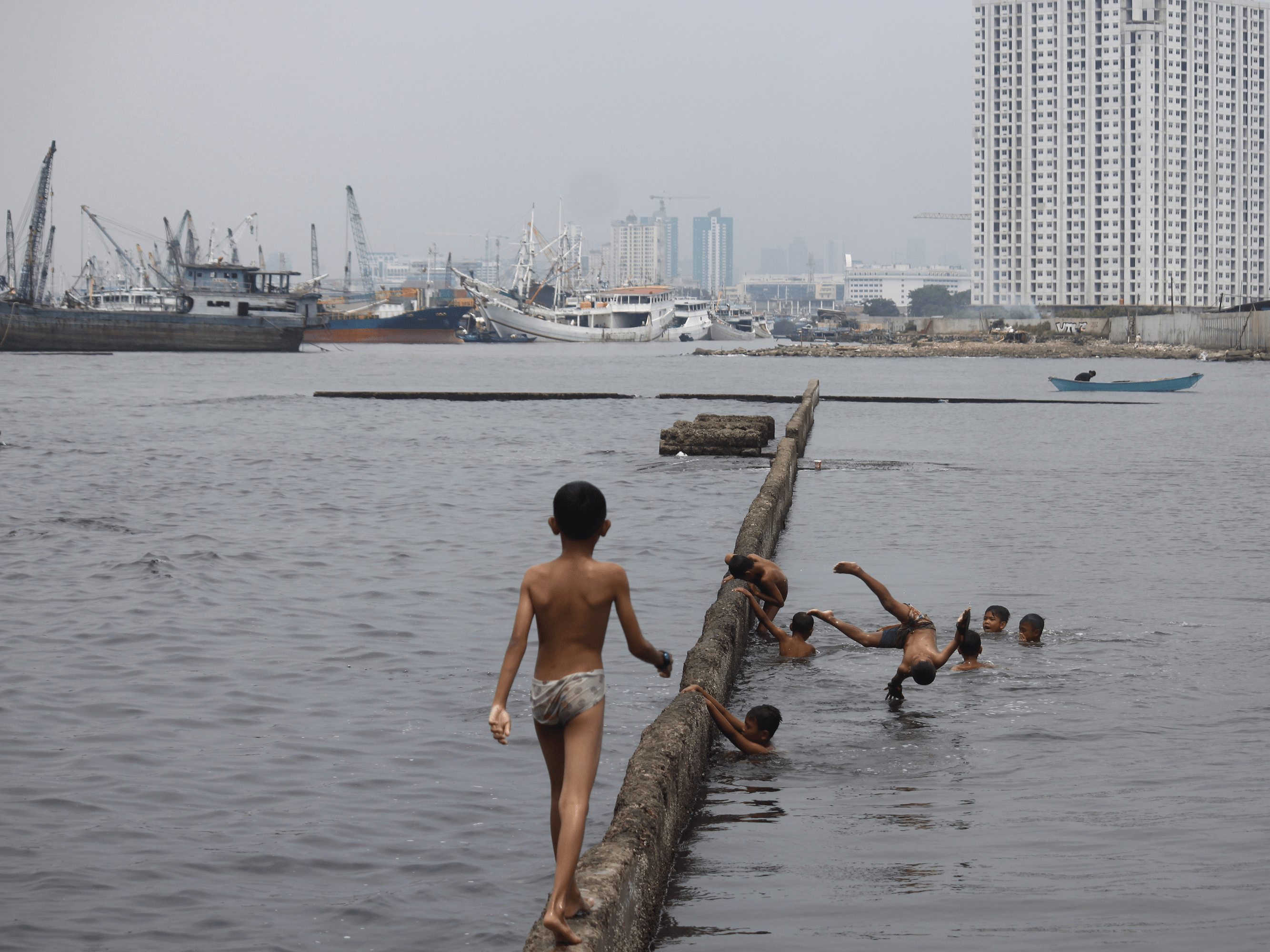 Photos: Indonesia's Capital City Of Jakarta Is Sinking And Flooding