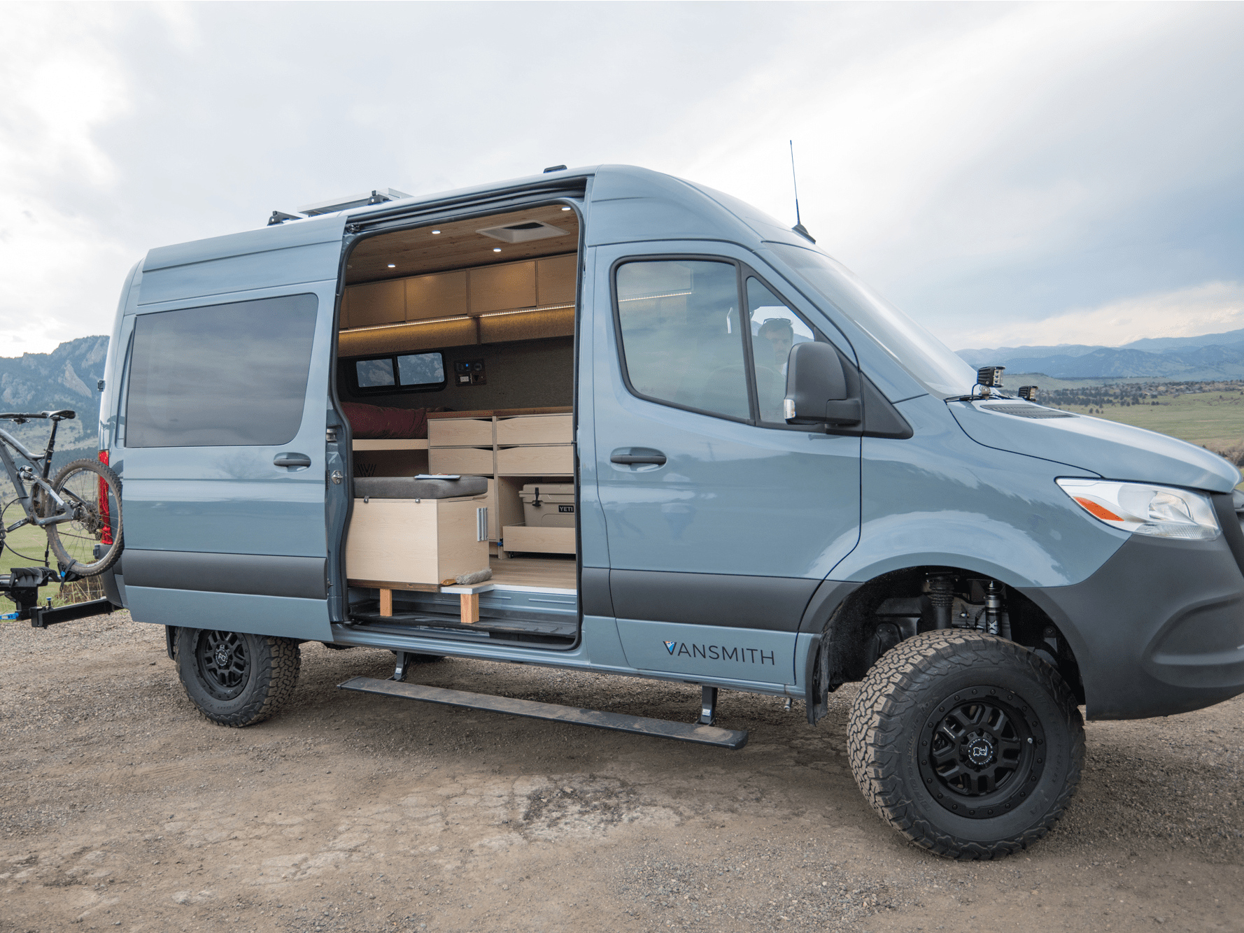 Vansmith has unveiled its new camper van with wood detailing built on a