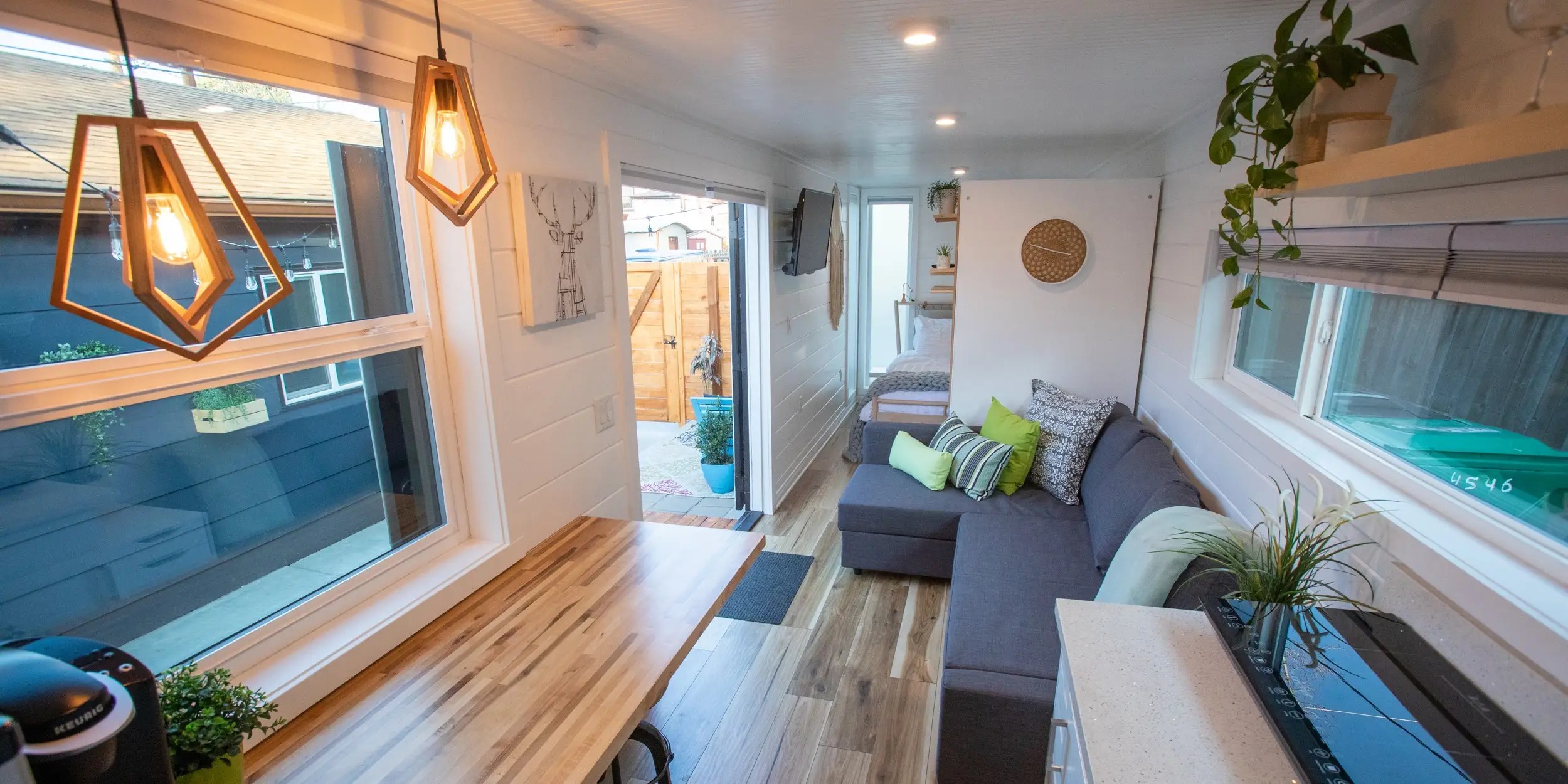 A company turns shipping containers into tiny one bedroom homes built