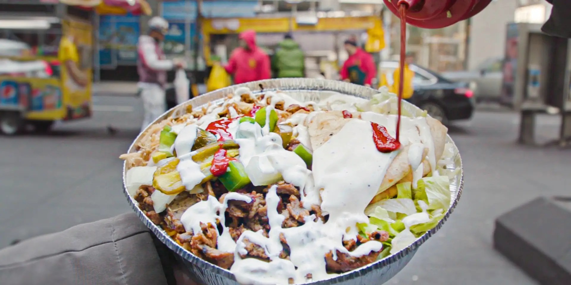 The Halal Guys Serve Iconic Street Food Platters in NYC