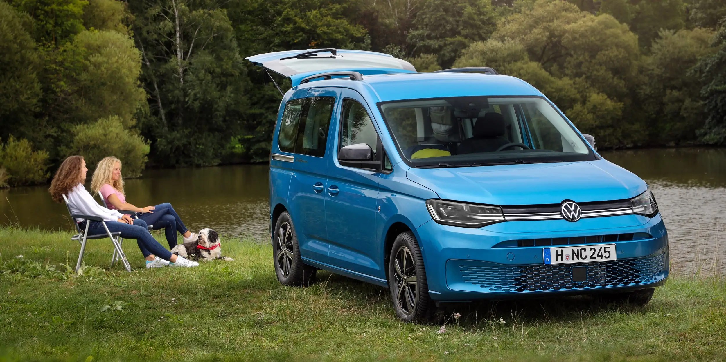 Volkswagen has unveiled its Caddy California camper van with a bed and