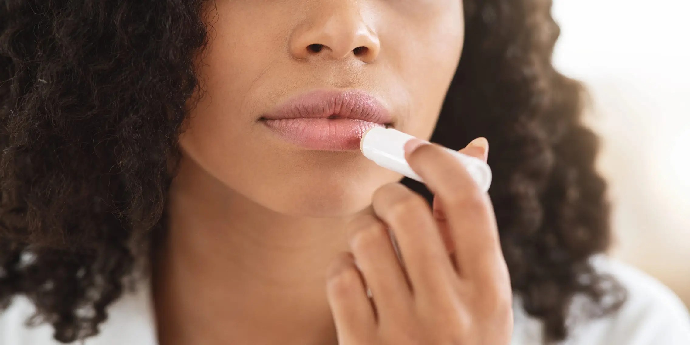 Why You Feel 'Addicted' to Chapstick, According to a Dermatologist