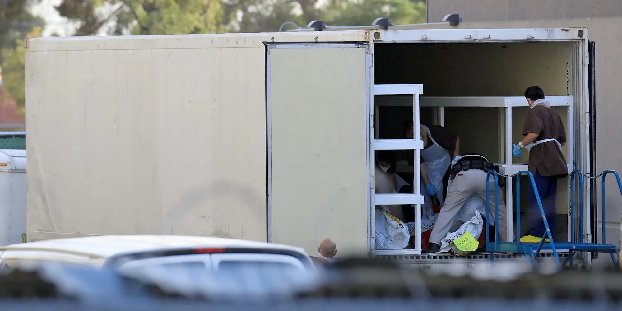 Photos show El Paso using refrigerated trucks in parking lots to store