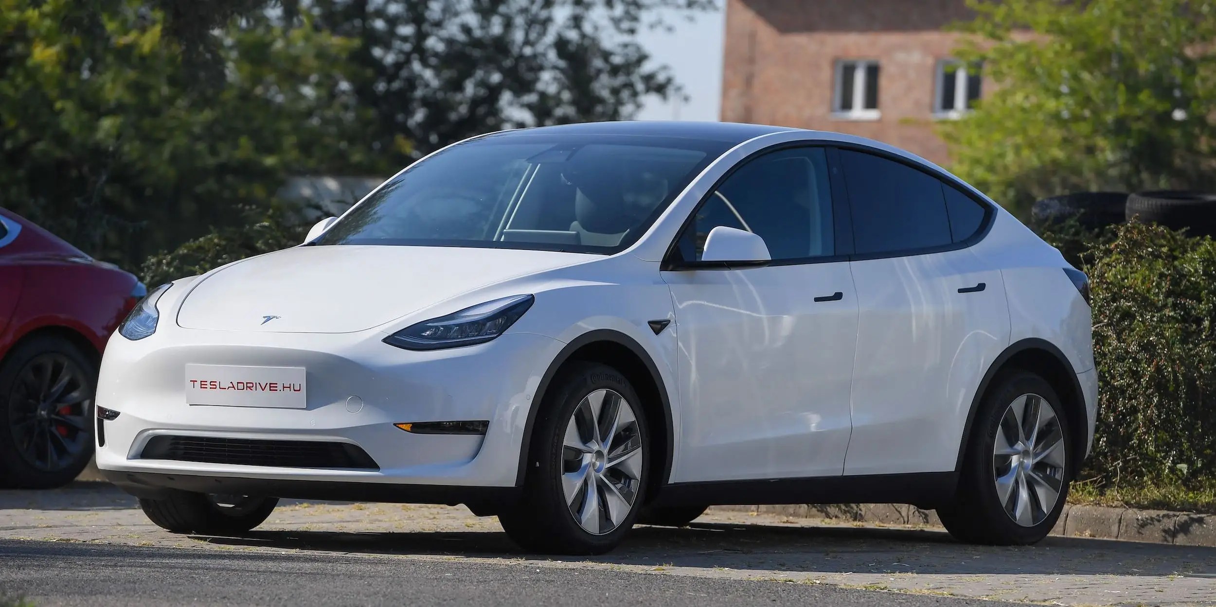 Tesla surges 4 to record high amid approval from China to sell its