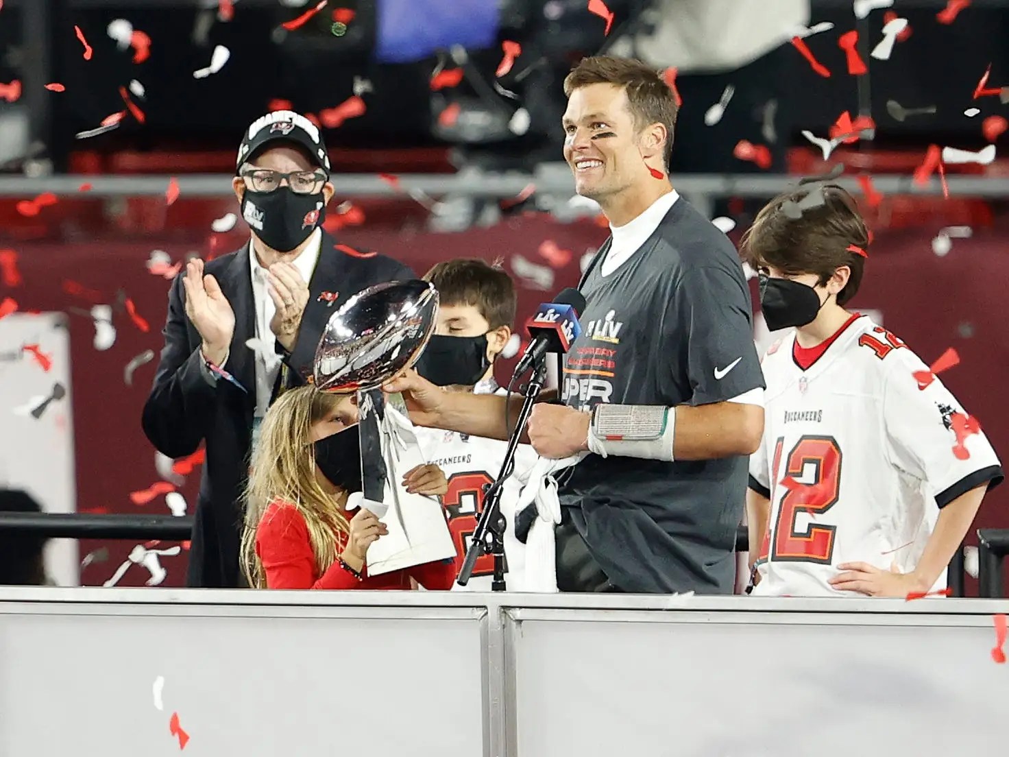 Tom Brady covered up his Nike swoosh after winning the Super Bowl to