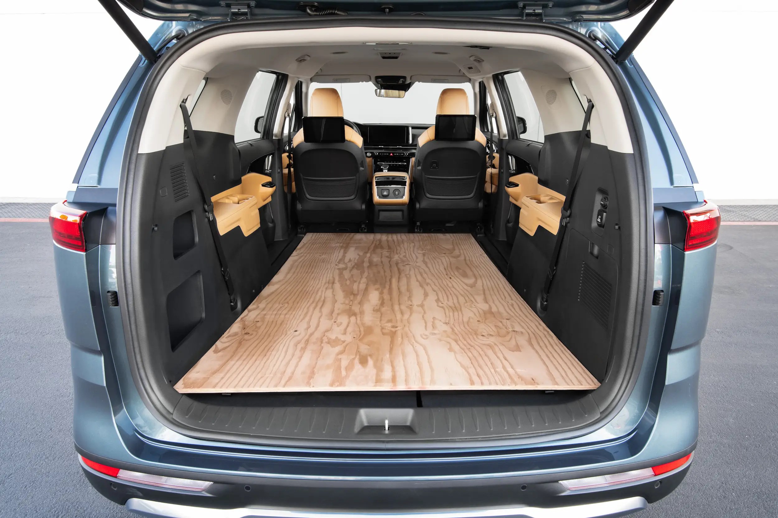 The new Kia Carnival minivan features rugged looks and reclining seats