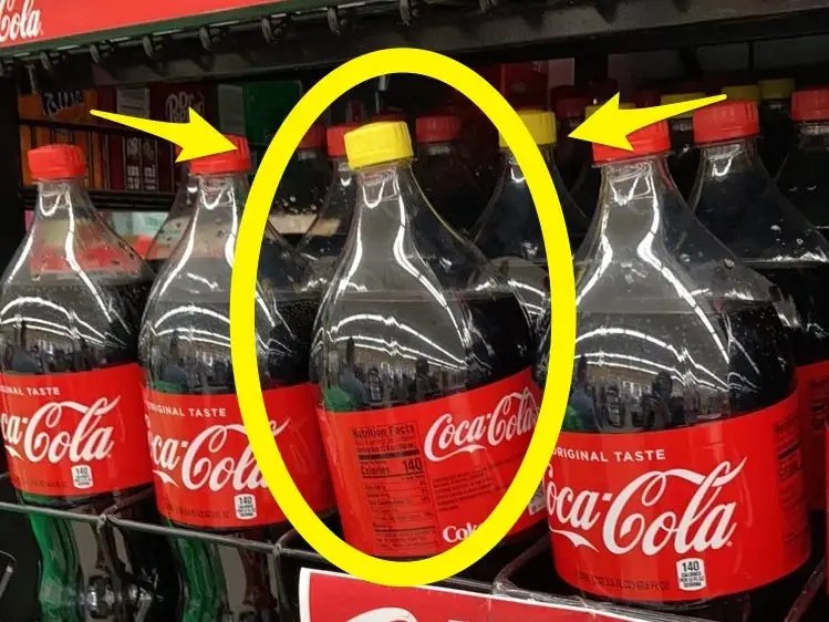 Here's why CocaCola bottles have yellow caps right now Business Insider