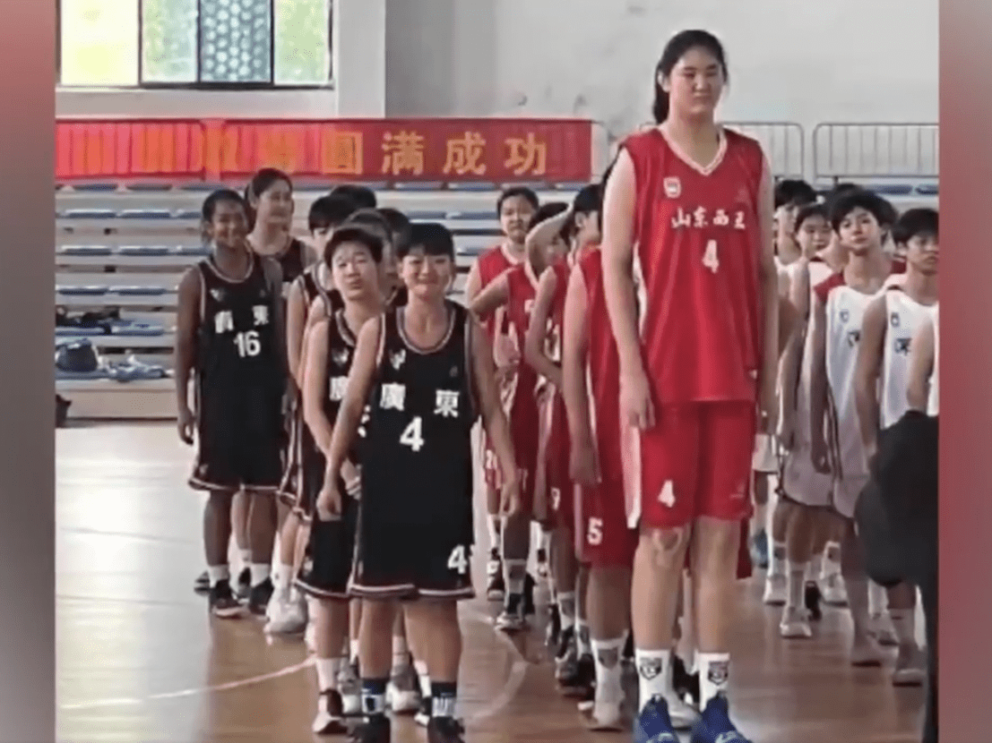 14 yearold Chinese basketball player who is 7foot4 compared to Yao