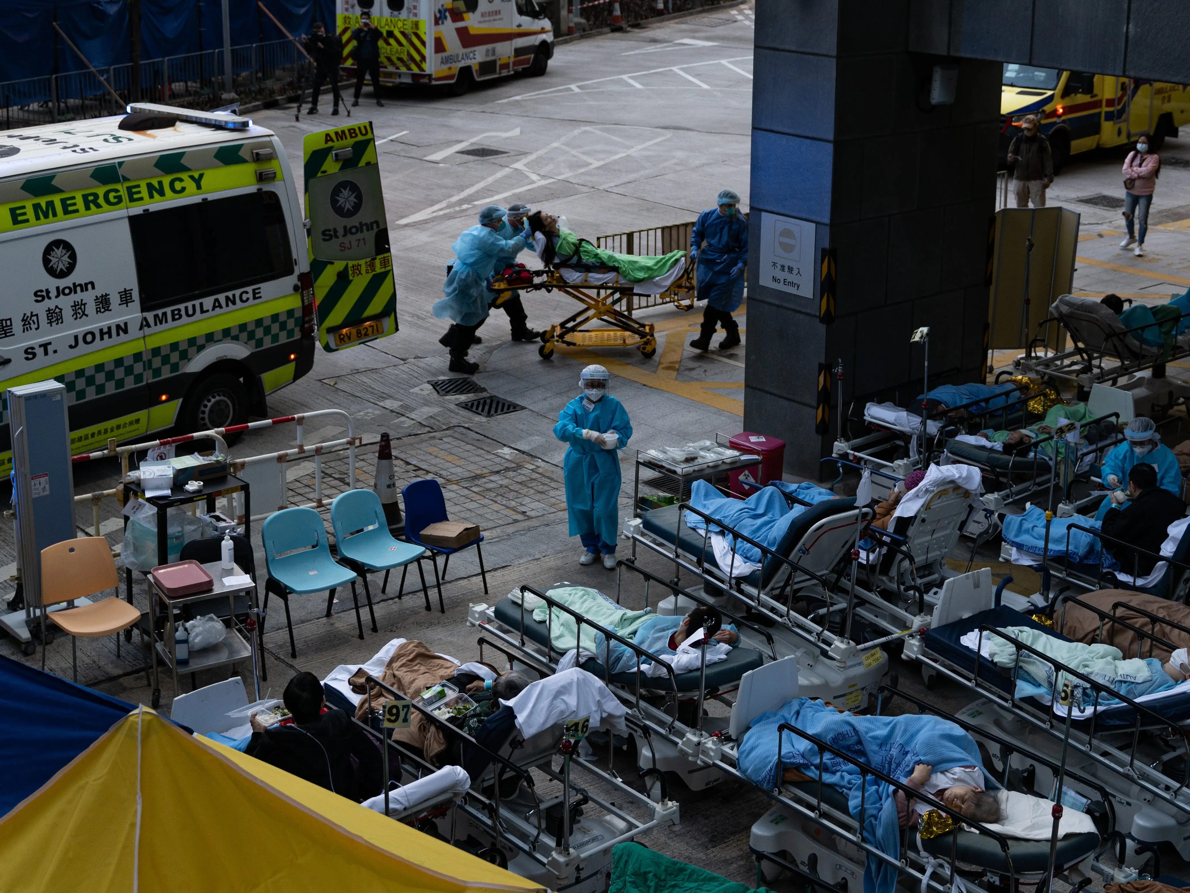 Patients Sleep Outside As Hong Kong's Hospitals Reach Breaking Point
