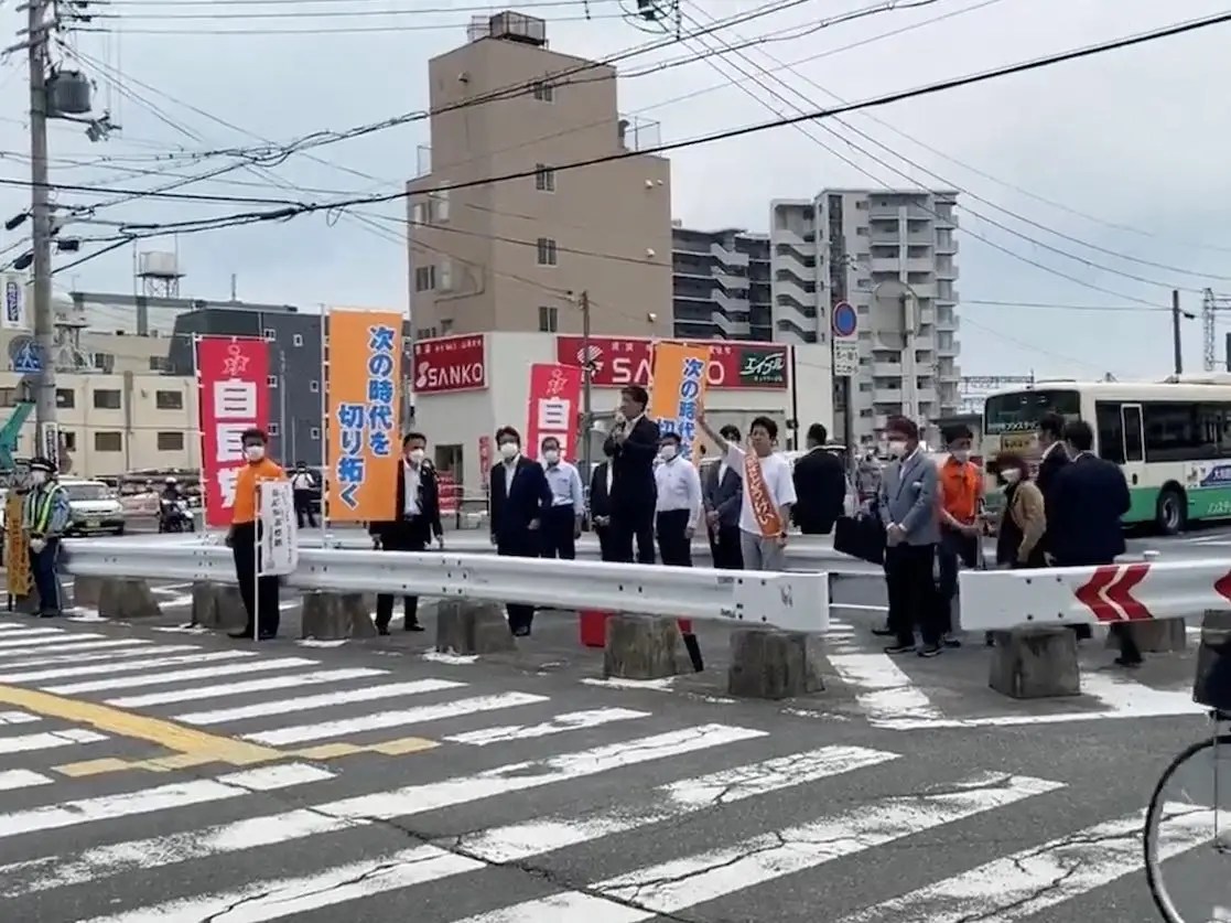 Shinzo Abe was only confirmed as speaker one day before event where he