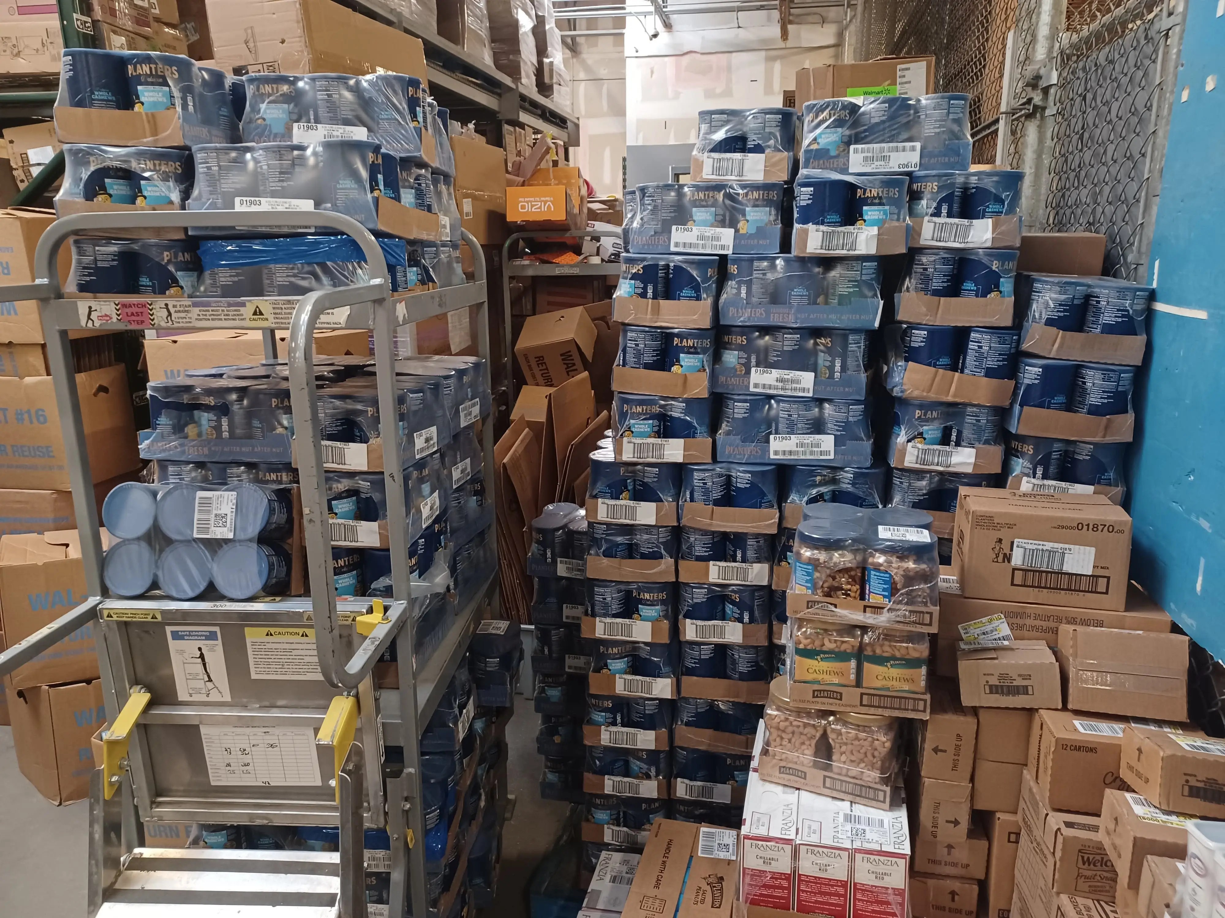 Photos from Walmart employees show pallets of overstocked items