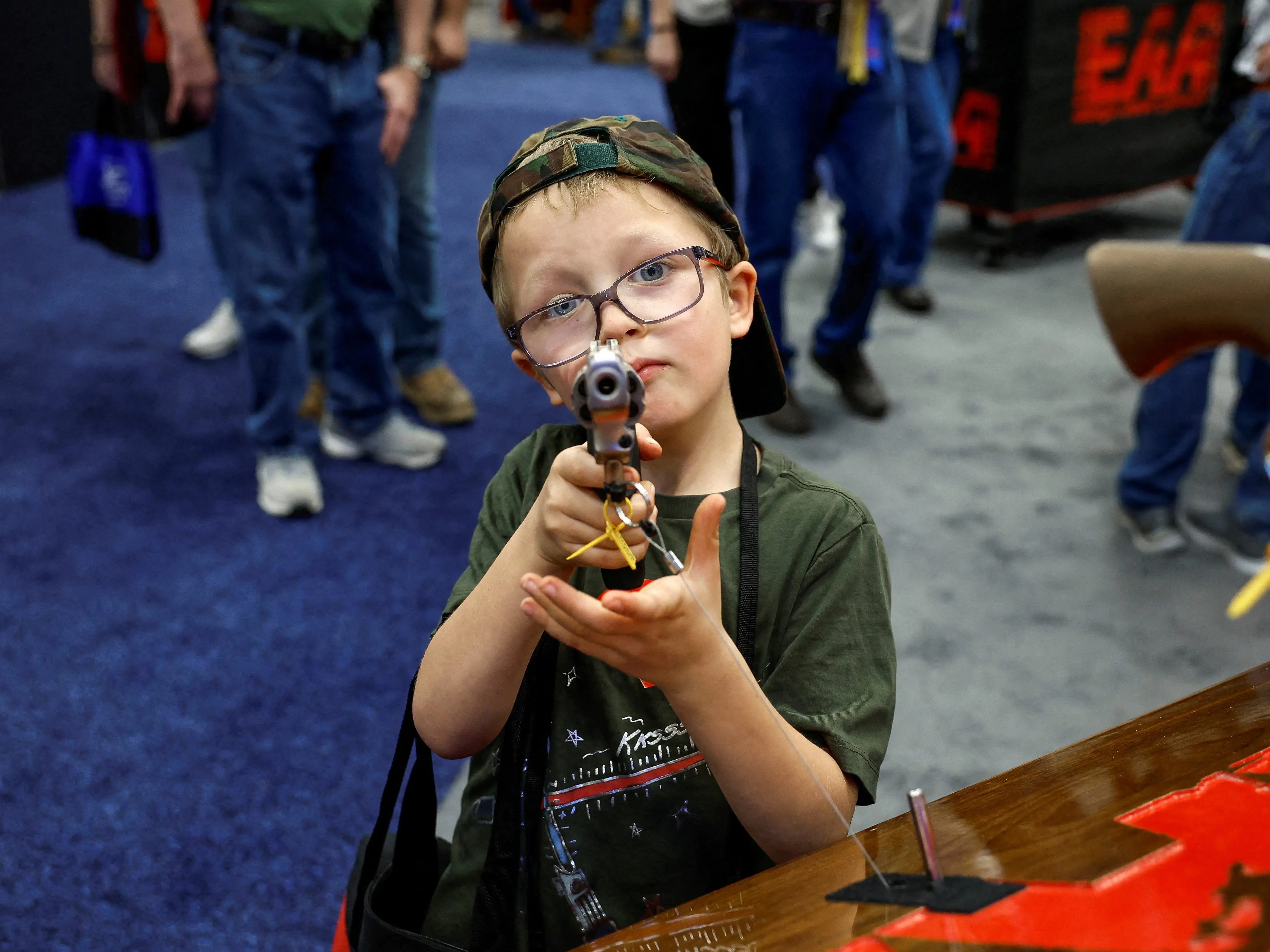 Photos Show Young Kids Handling Guns at NRA's Annual Meeting Business