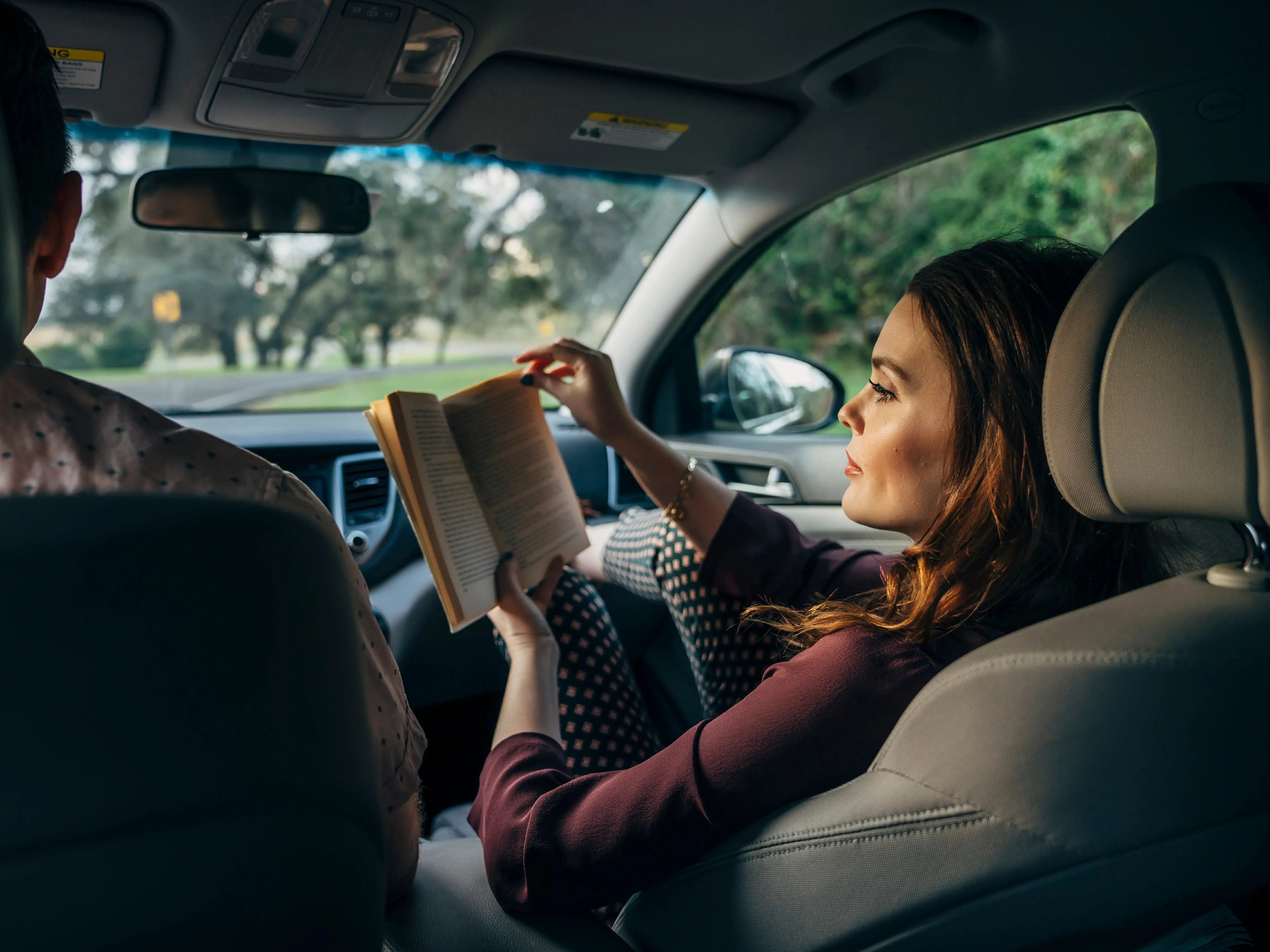 Why Does Reading in the Car Make You Carsick? - Business Insider