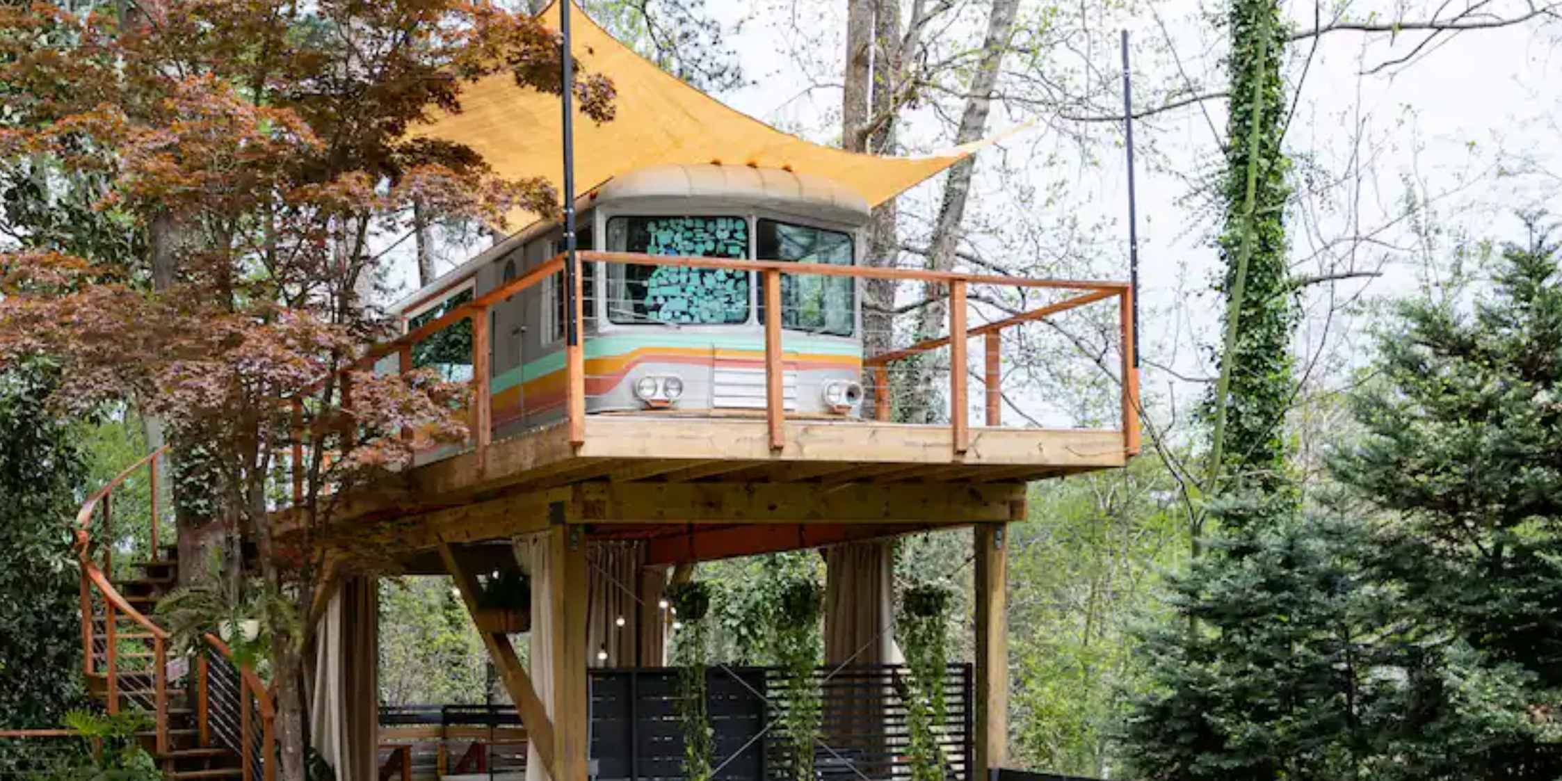We Converted an Old Trailer Into a Retro Airbnb Treehouse — See Inside