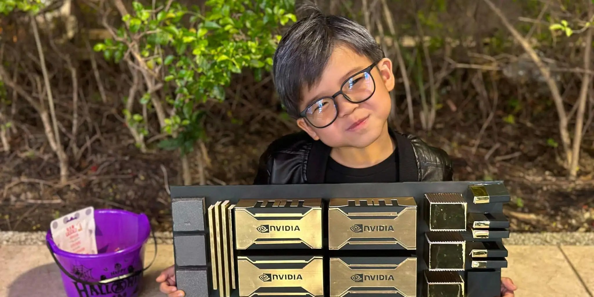 This 5-year-old kid who dressed up as Jensen Huang for a festival has already won Halloween