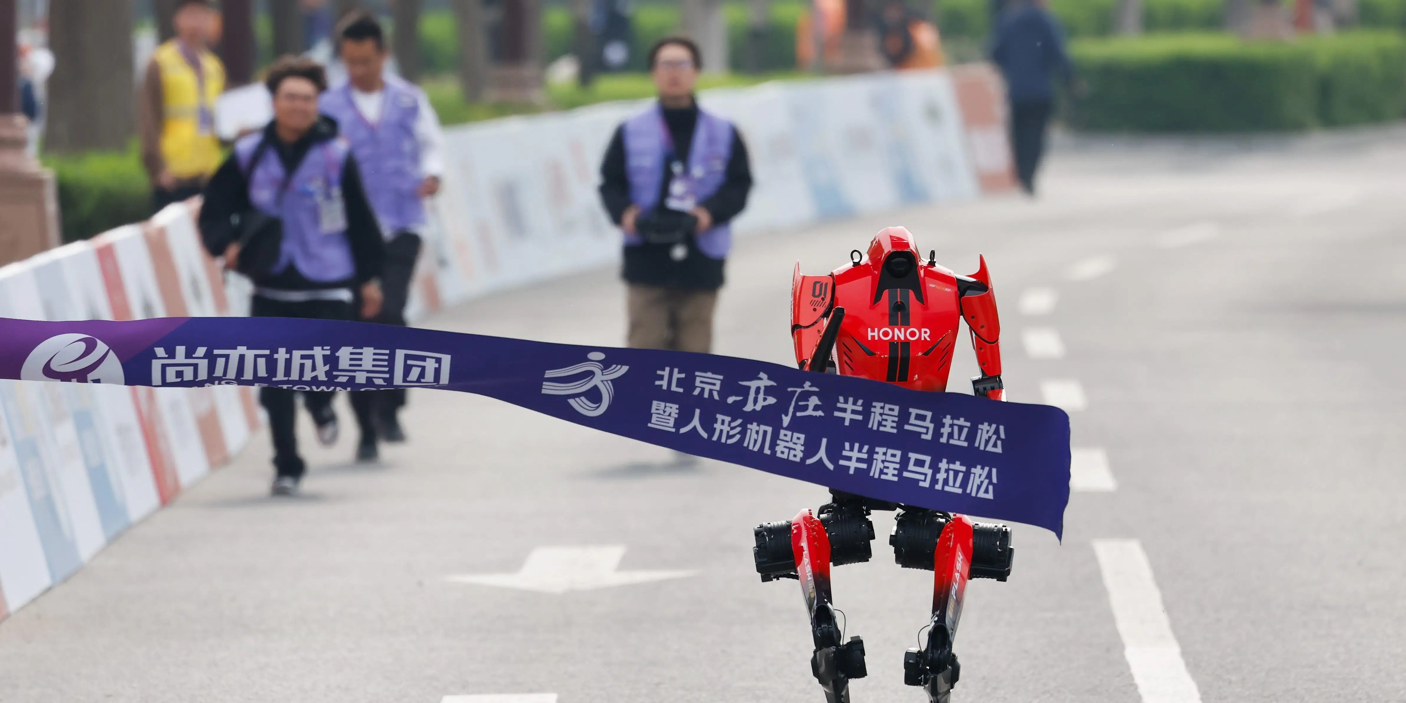 China’s Robot Half Marathon Sets Record, Sparks Laughs
