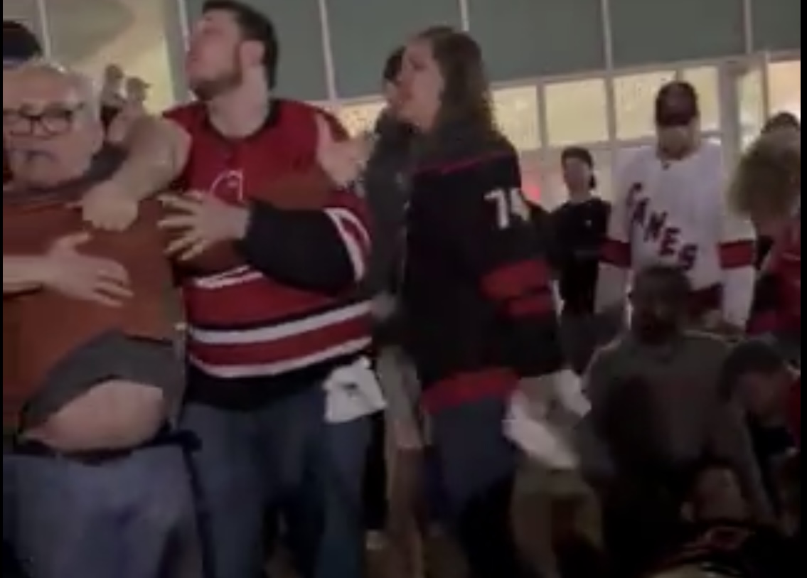 Hurricanes fan knocked unconscious by angry Rangers fan