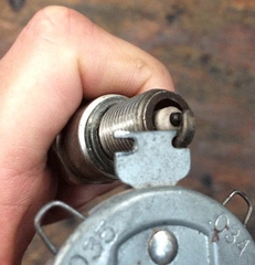 Does this new spark plug look okay? Seems misaligned... | Vintage