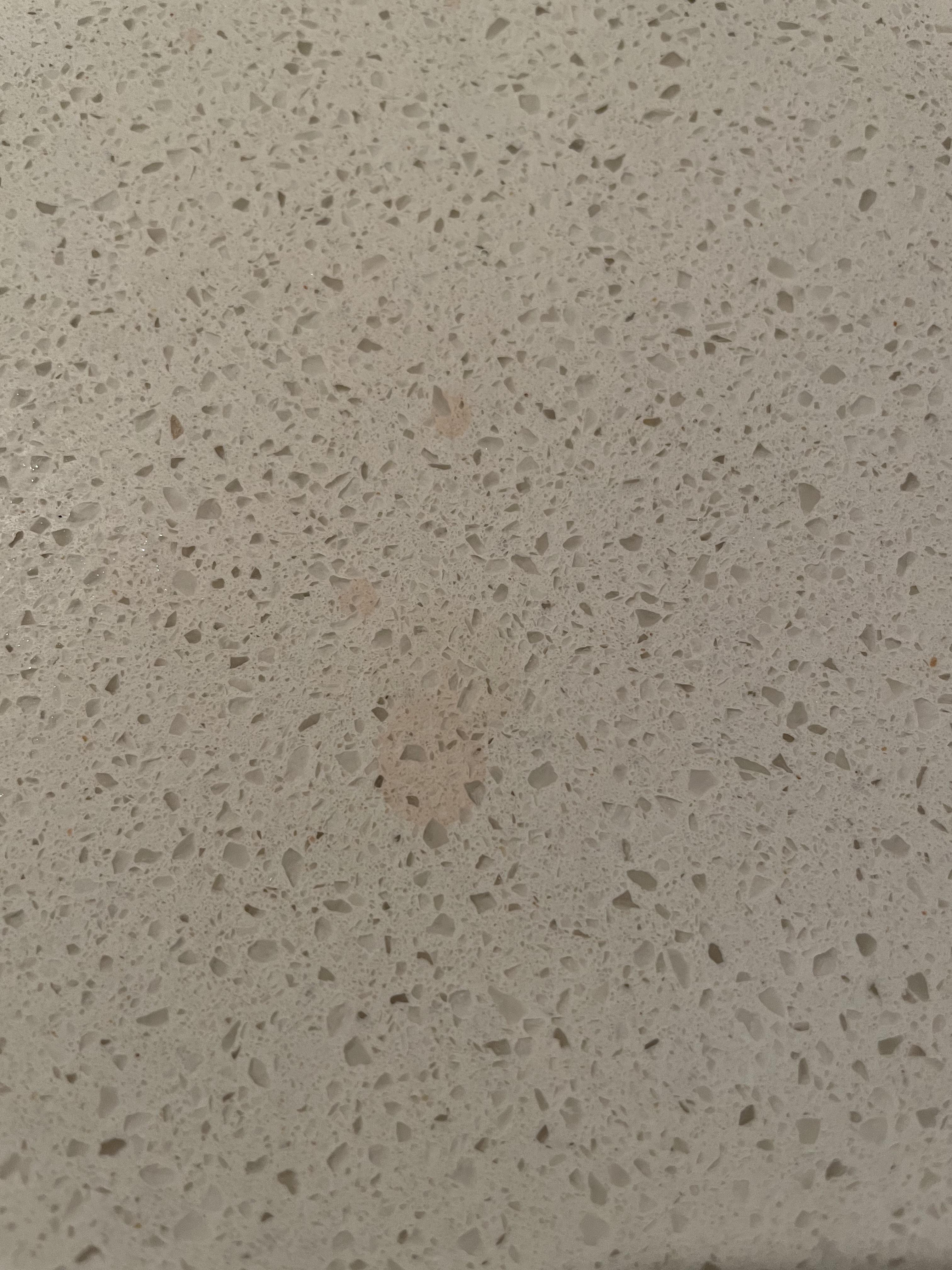 Spots on brand new quartz countertops! Spilled a few drops of Angostura