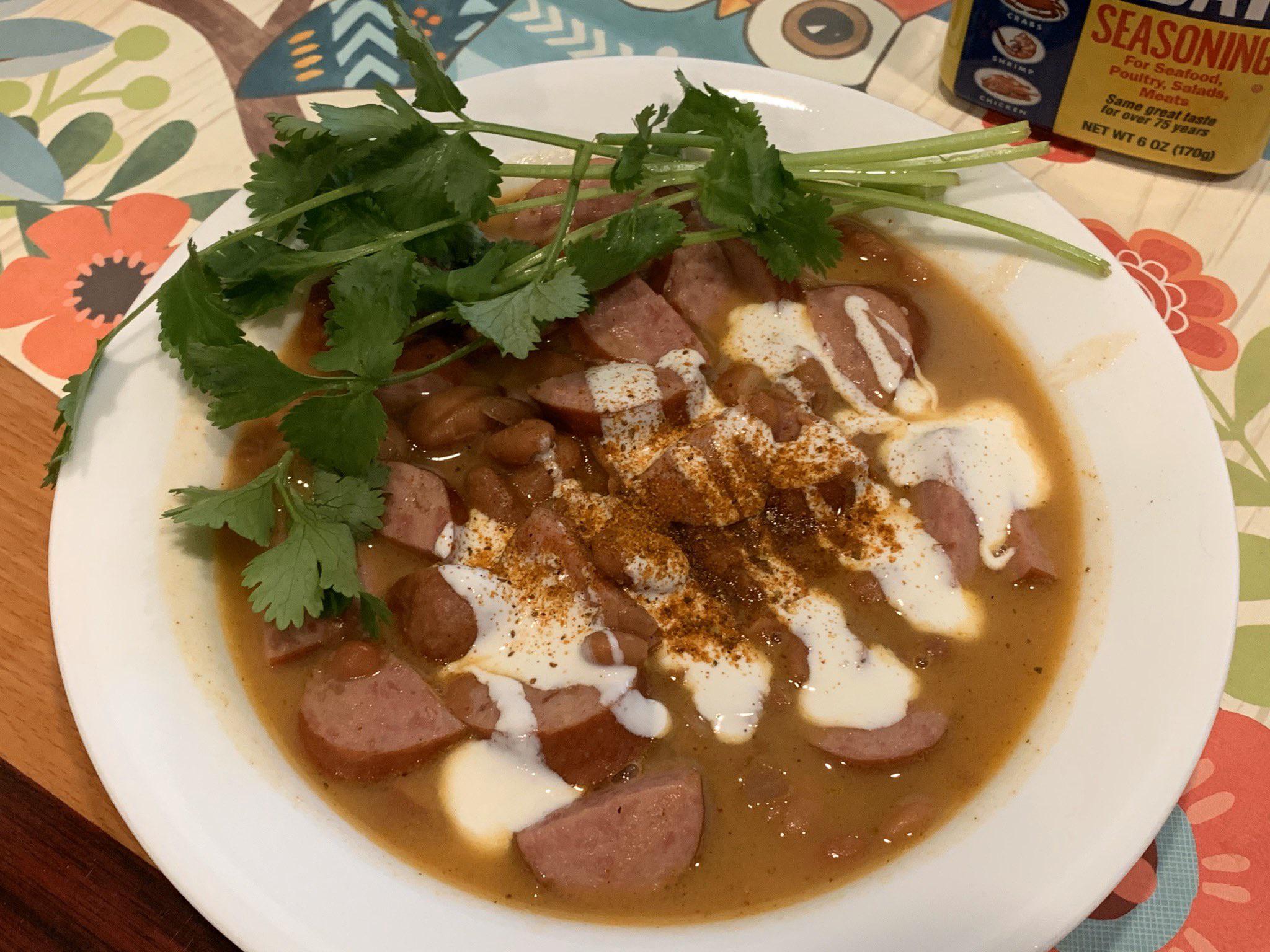 I made this weird soup(?) with kielbasa, canned pinto beans, chicken broth, crema, and cilantro