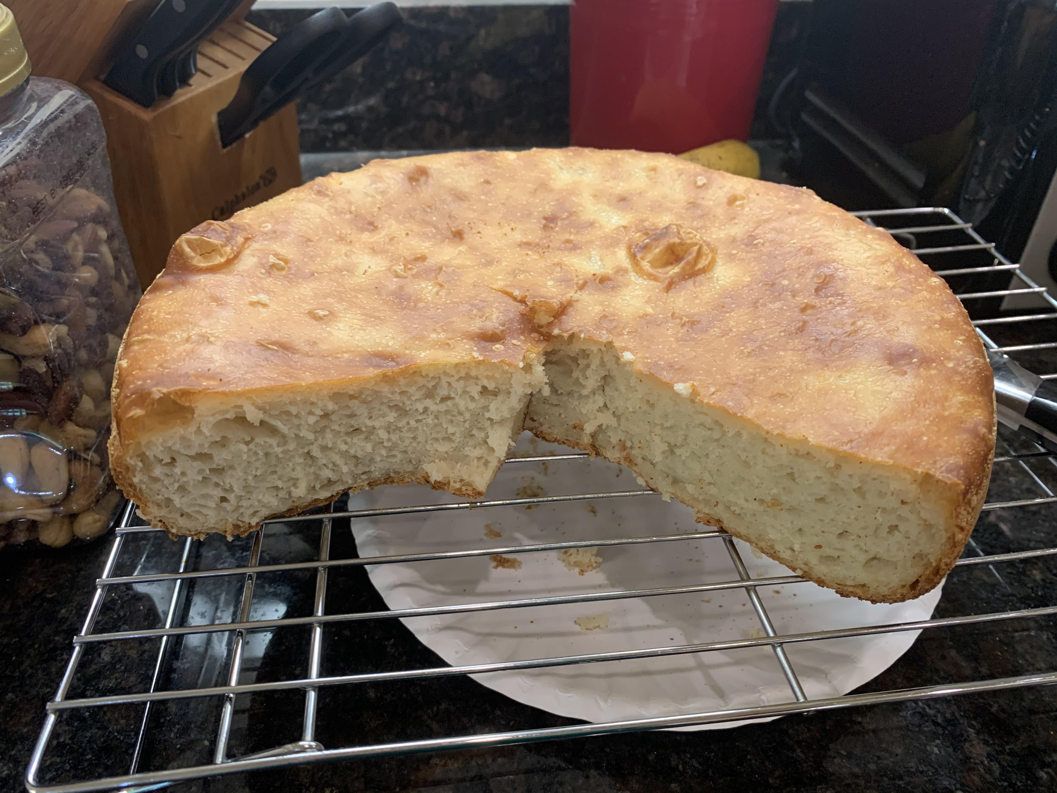 Homemade bread attempt 2 came out okay. My Dutch oven was bigger than
