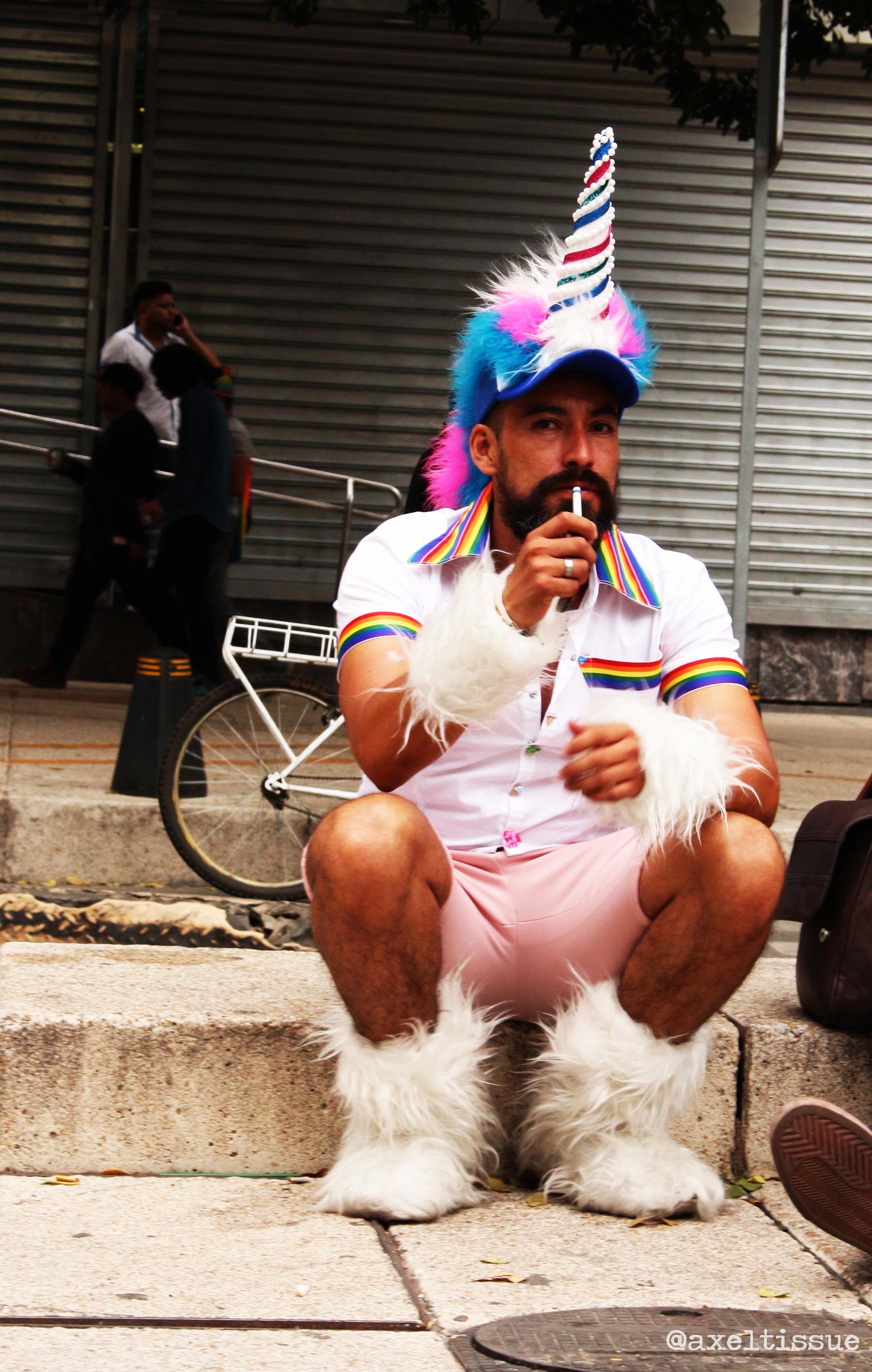 A Man Dressed as a unicorn at Mexico City International Pride Day. r