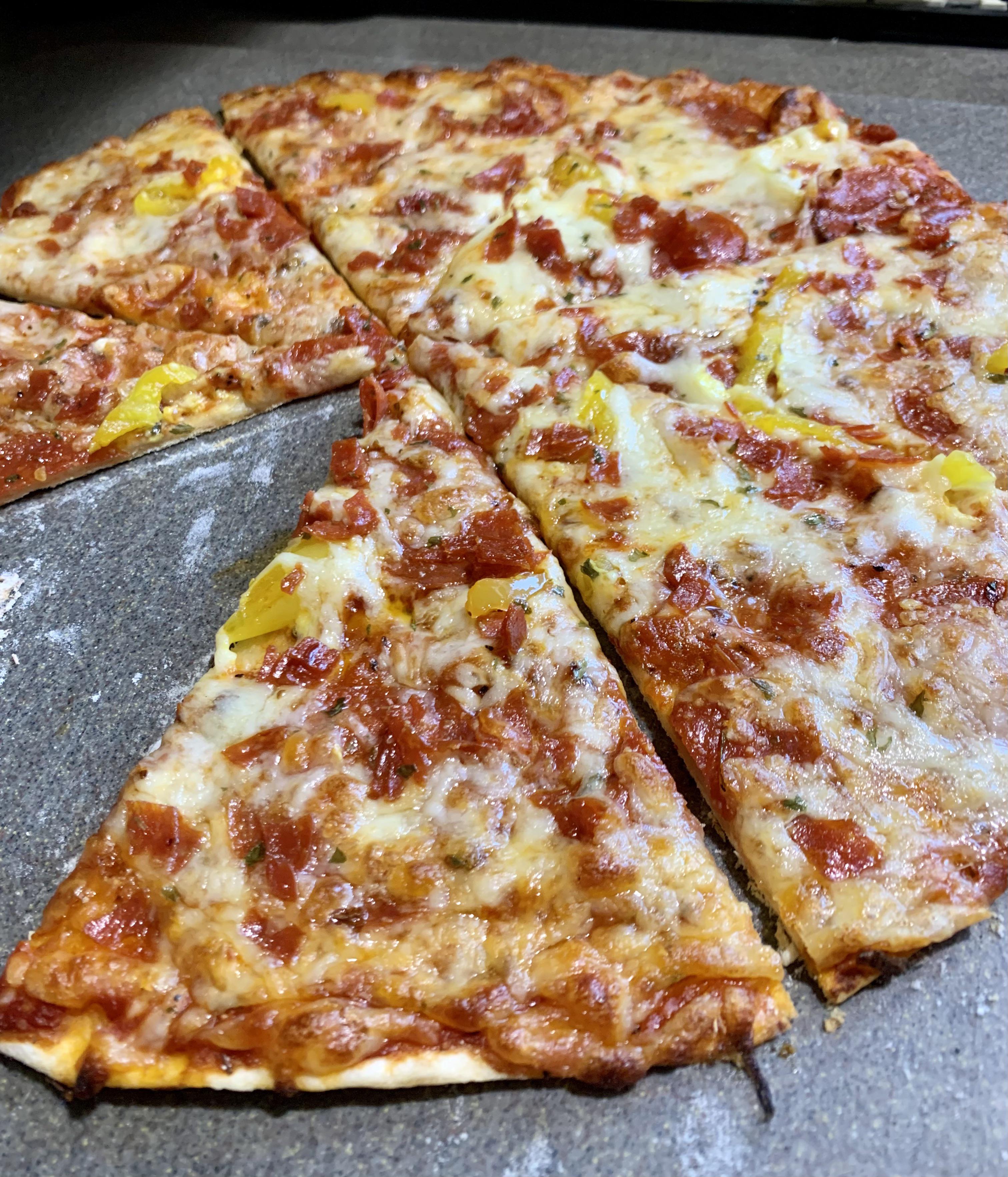 (Homemade) Thin crust Pepperoni and Yellow Pepper Rings. r/Pizza