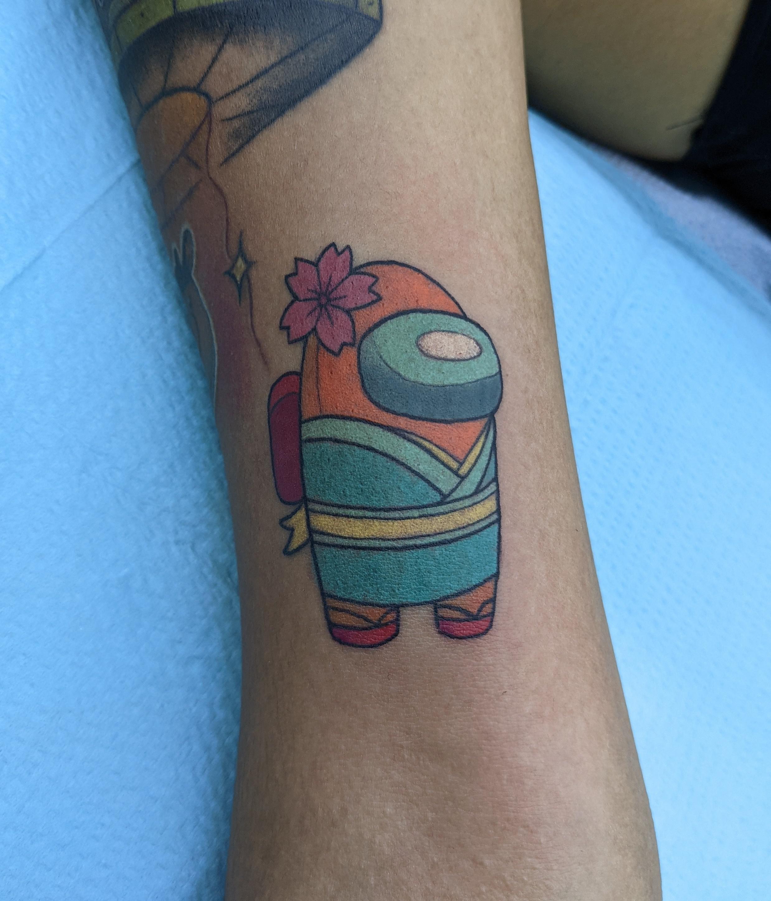 I tattooed this custom AmongUs piece today r/AmongUs