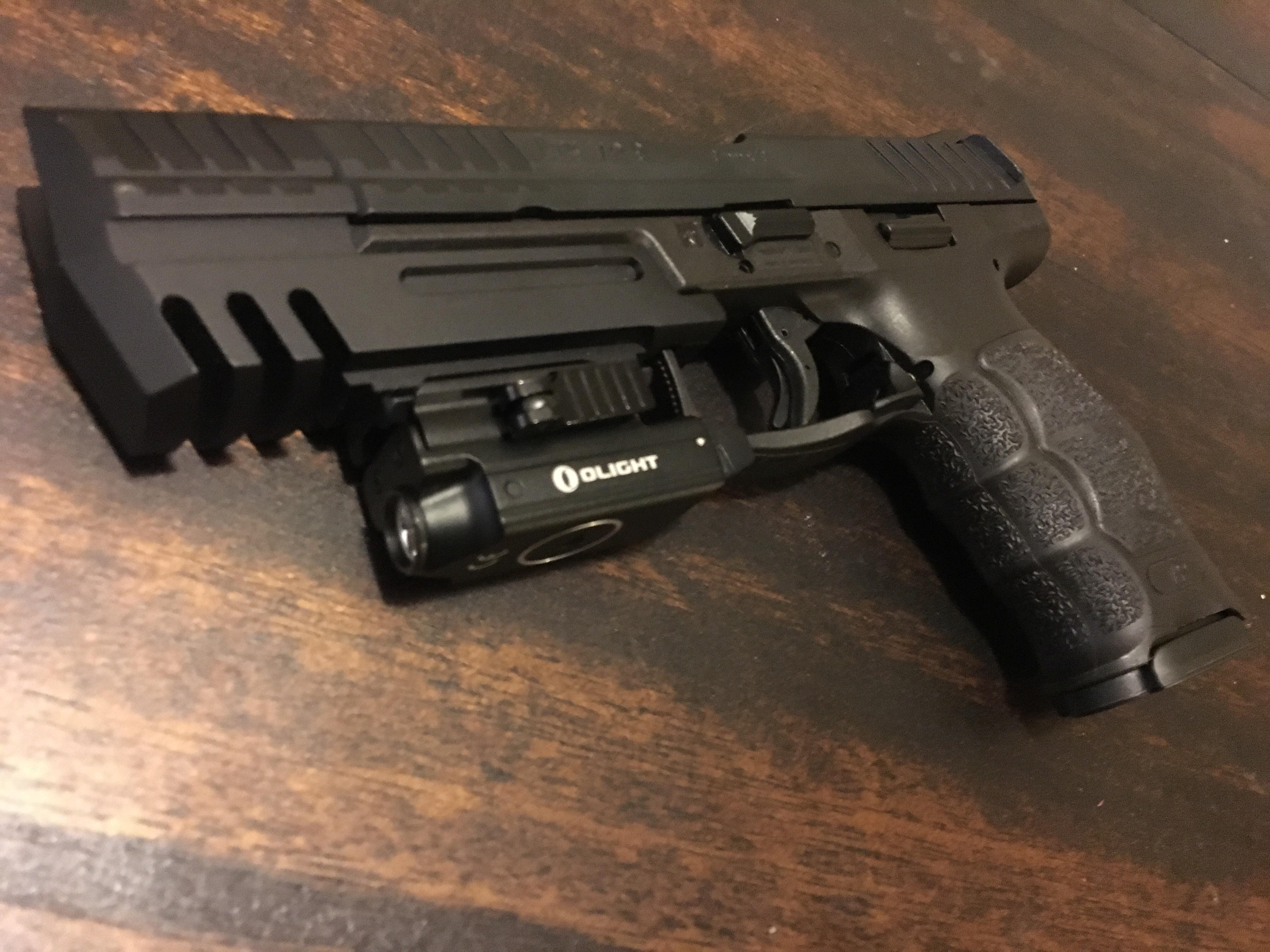 My HK VP9 in its final form. I like to accessorize. r/guns