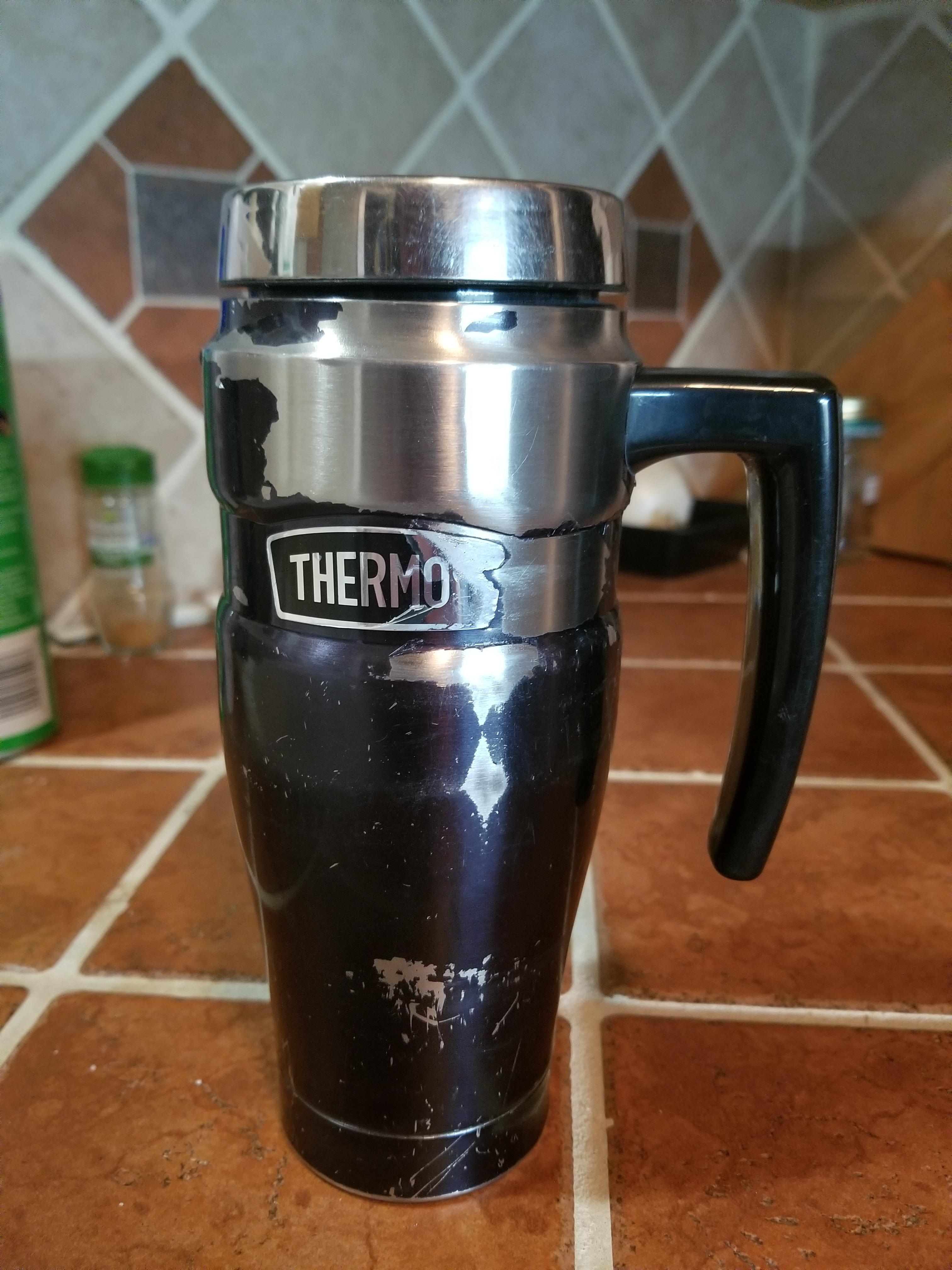 Thermos brand coffee mug. Survived my time working on a farm. r/Wellworn
