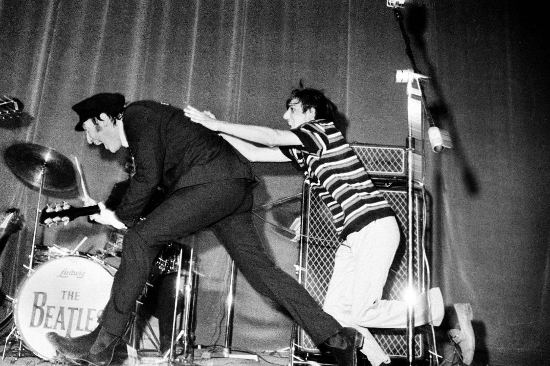 Fan girl attacks John Lennon mid set r/beatles