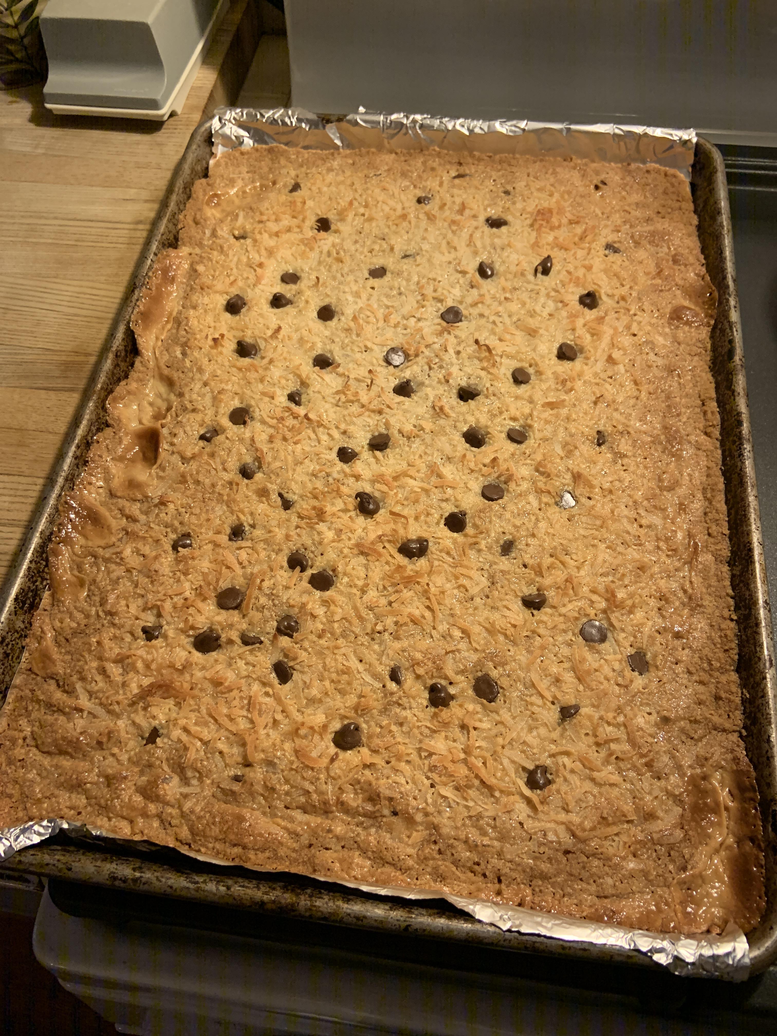 Cookie bars with graham crackers, sweetened condensed milk, coconut, and chocolate chips r