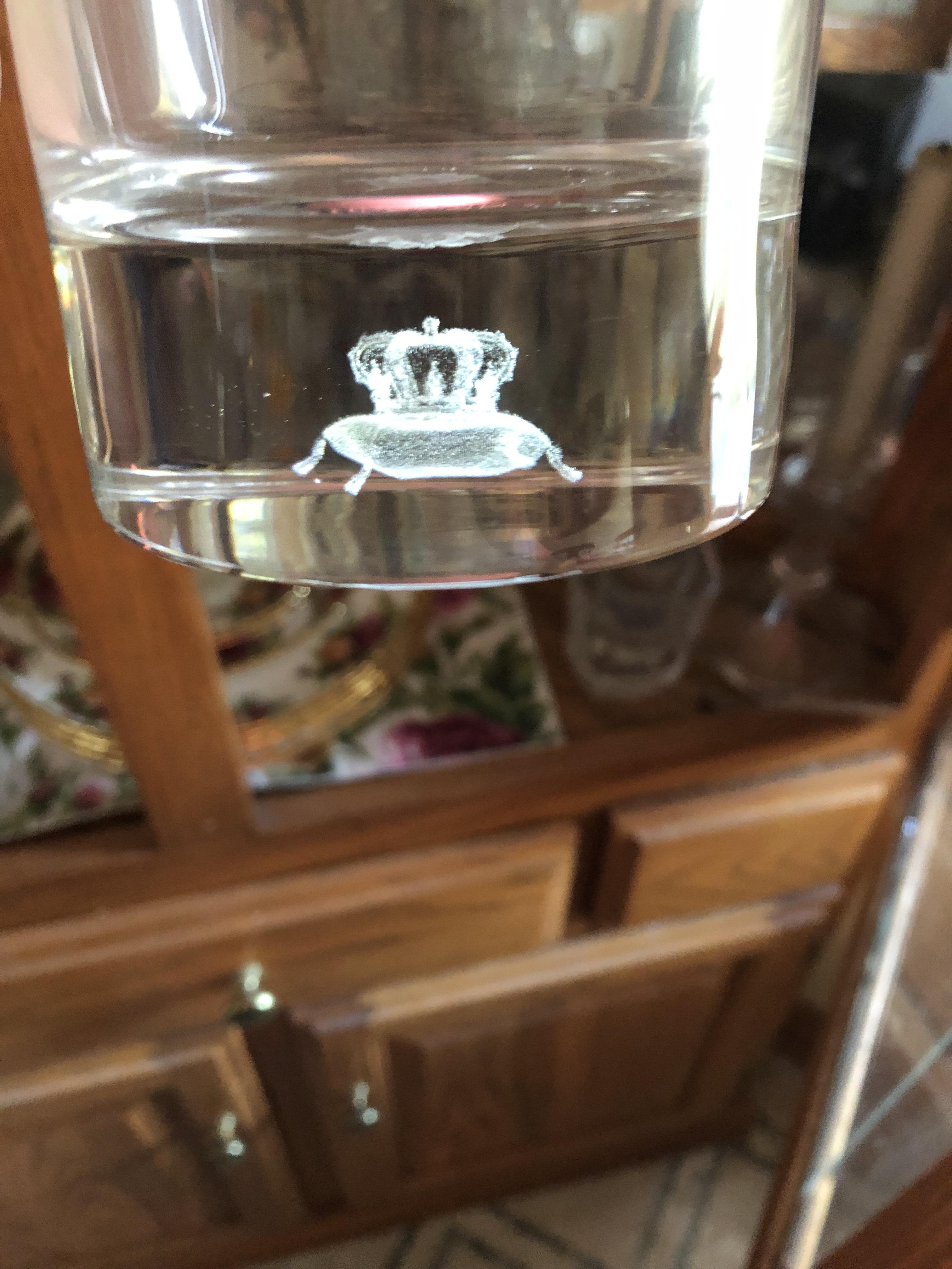 This Crown Royal Whiskey glass has a little crown in the bottom r