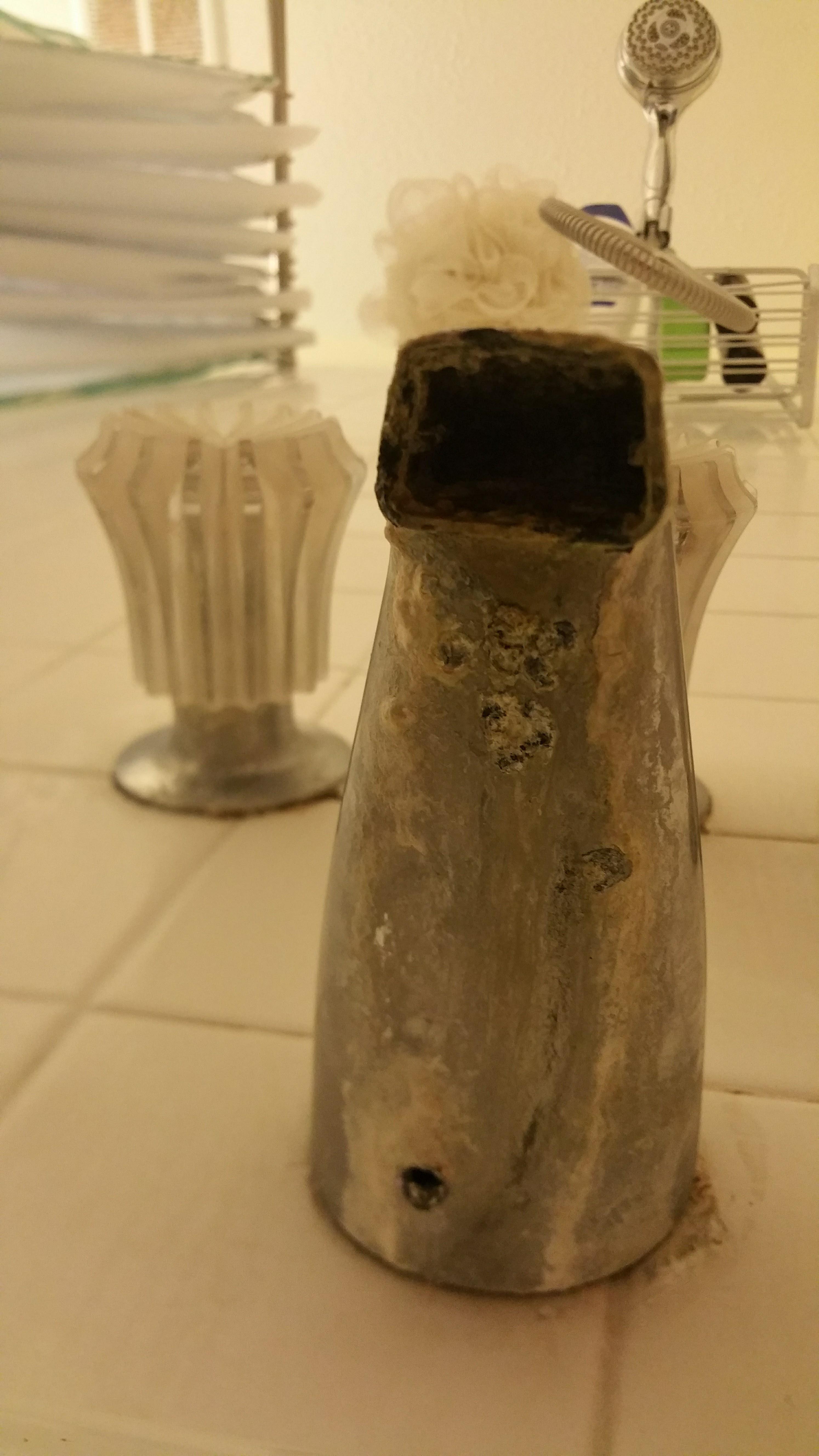 Am I looking at a hack saw, or how do I get this old tub spout off