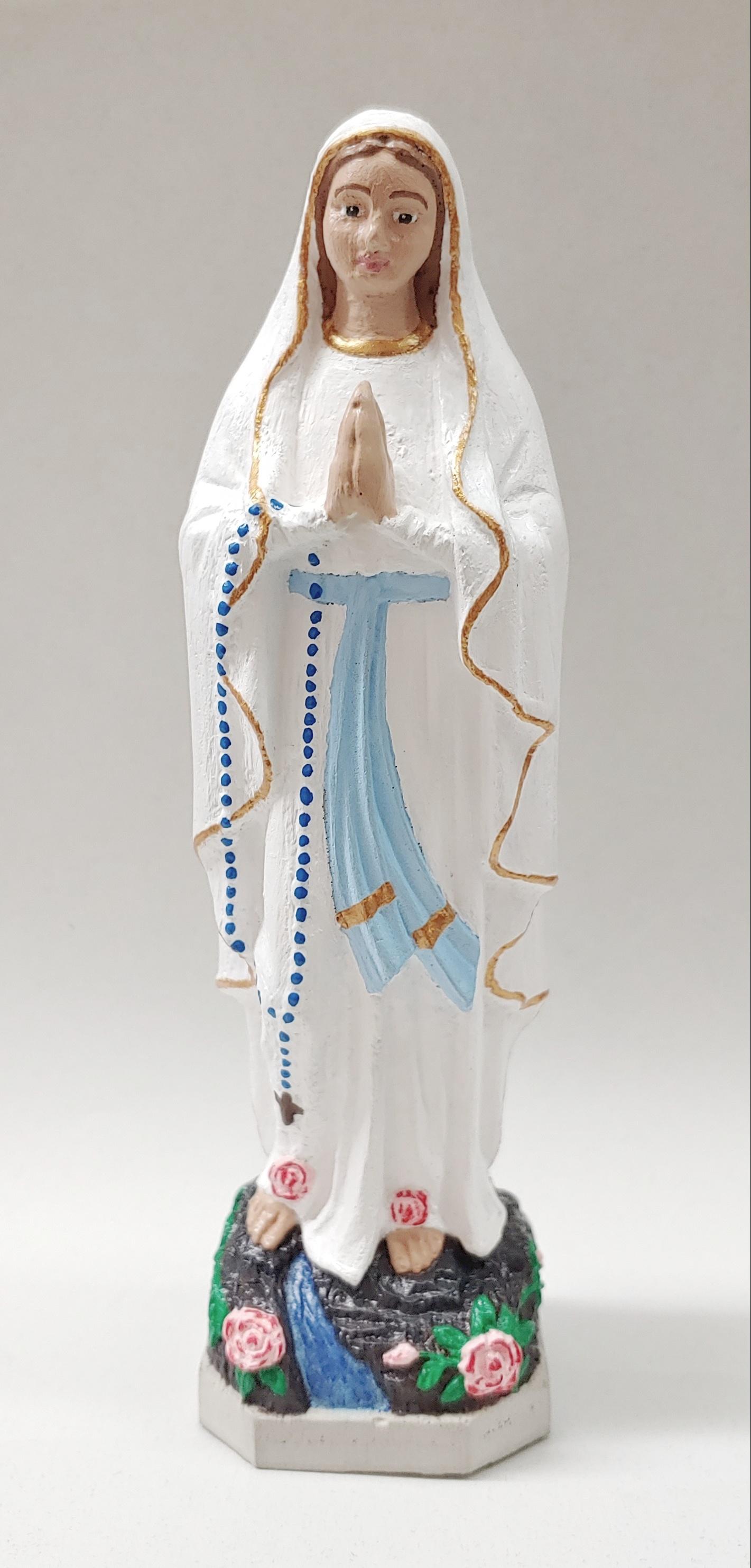 I painted an Our Lady of Lourdes statue, that I made with cement! [FREE