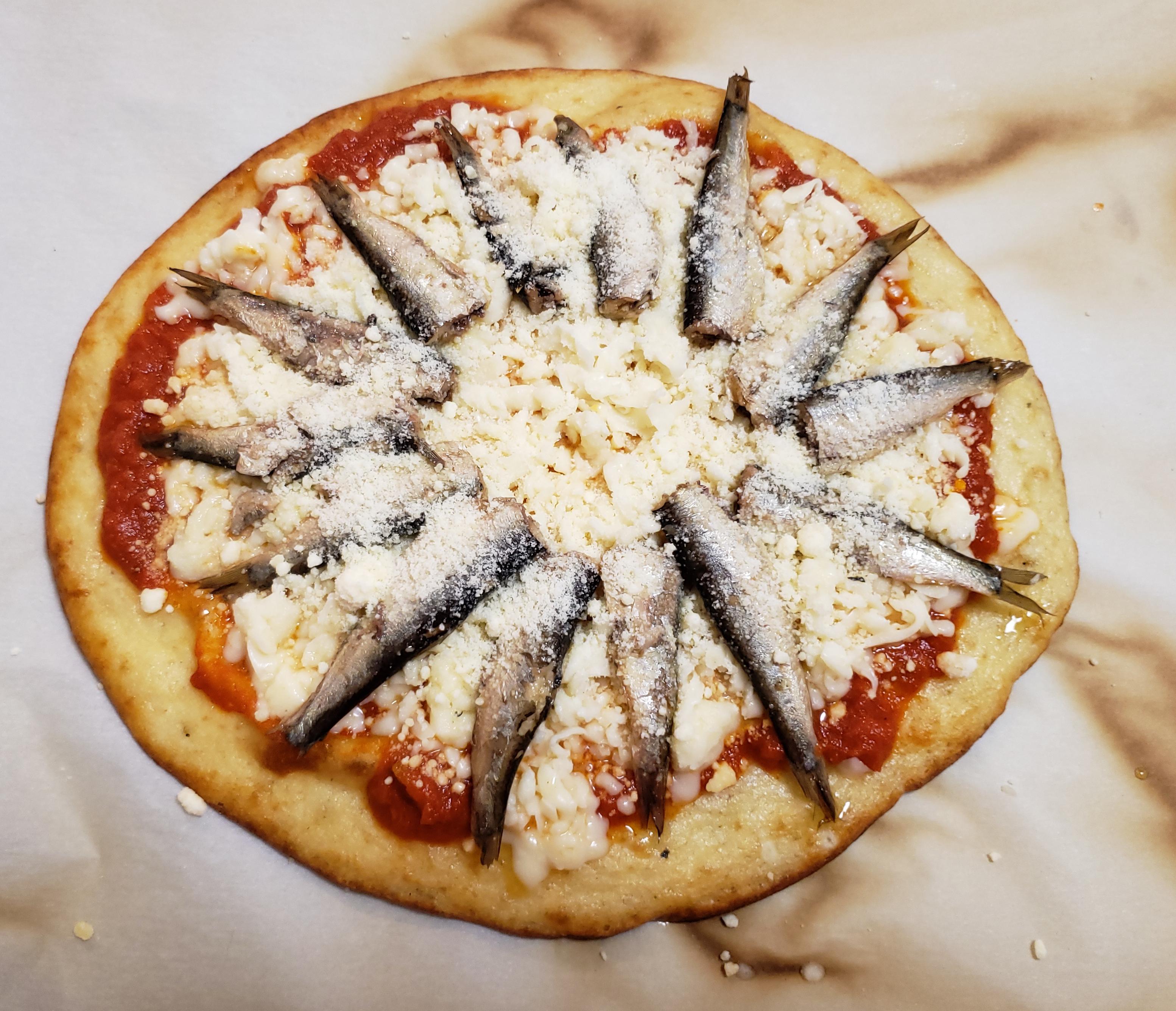 Delicious fathead pizza (w/o cream cheese) with sardines r/ketorecipes