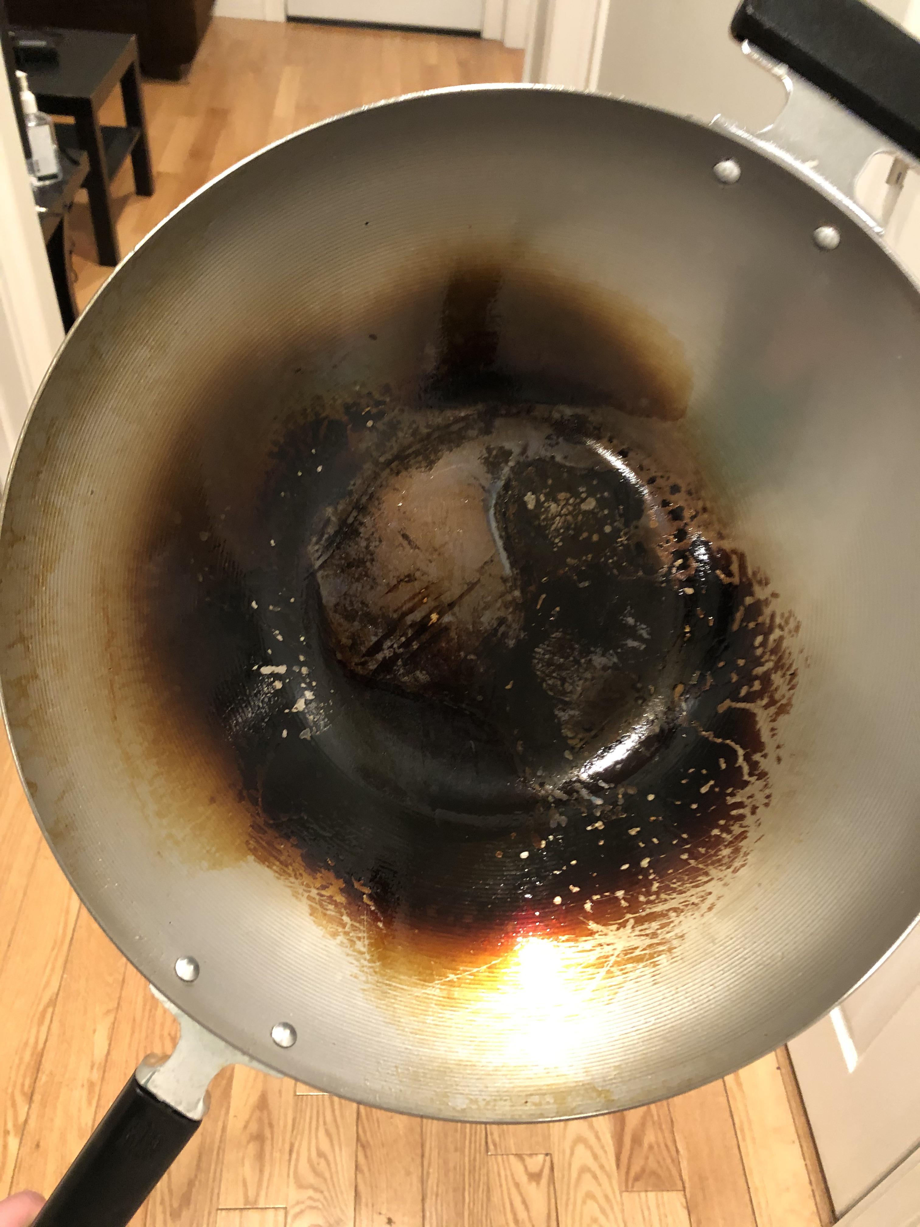 What’s going on here? Carbon steel wok might need help r/wok