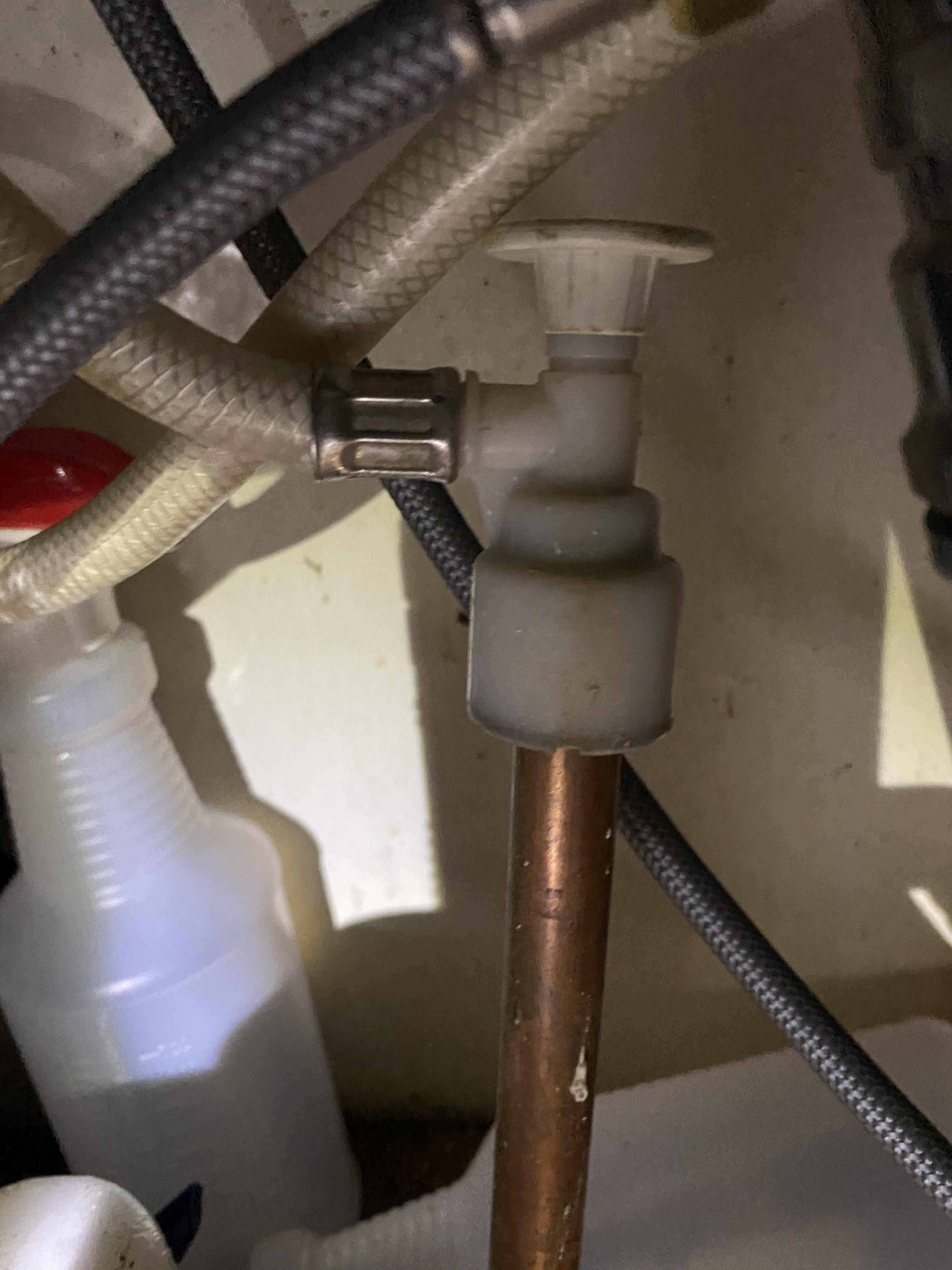 This fitting looks like I can’t unscrew the tubing. I have a new faucet