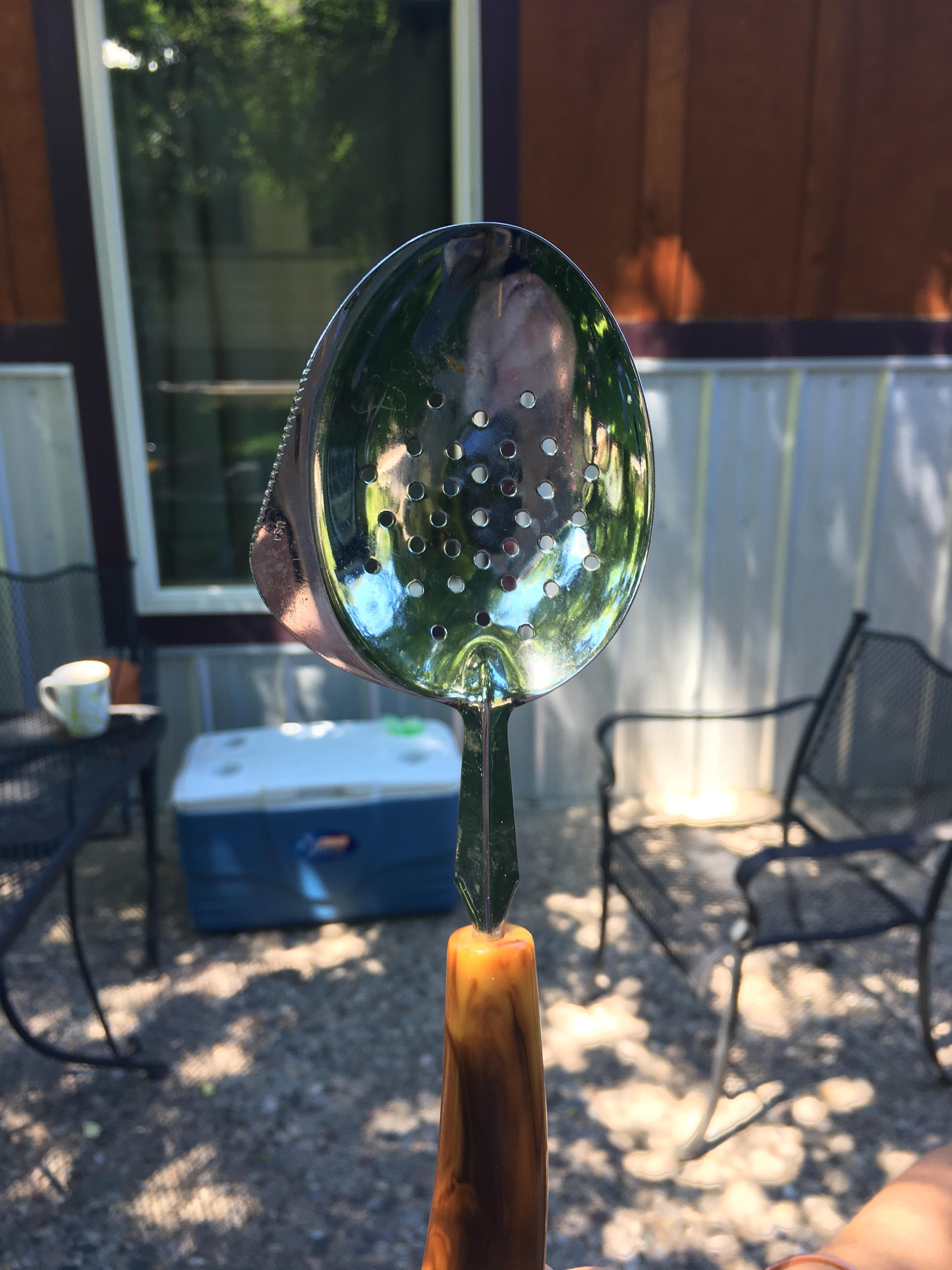 Slotted spoon with a flared serrated edge r/whatisthisthing